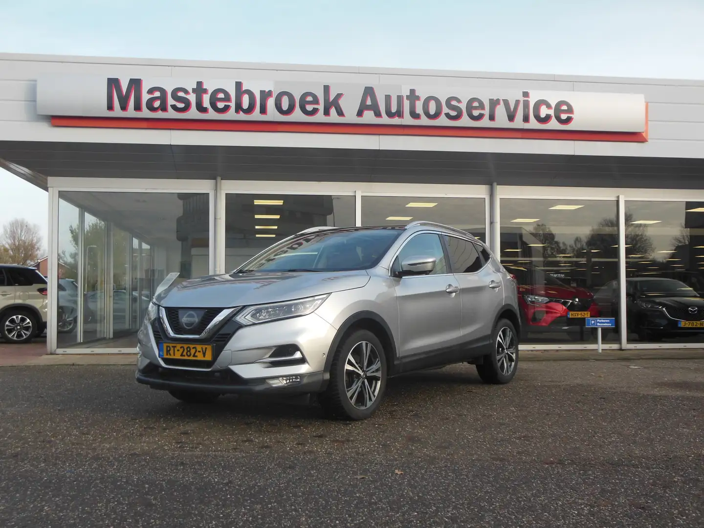 Nissan Qashqai 1.2 Tekna + Staat in Hardenberg Grau - 1