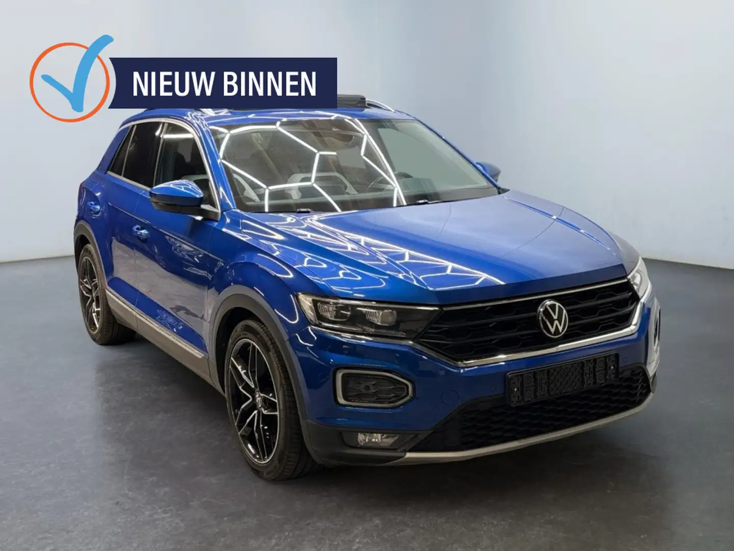 Volkswagen T-Roc 1.5 TSI Sport | Panoramadak | Camera | Half ledere Blauw - 1