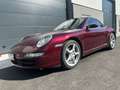 Porsche 997 997 Carrera 4 CABRIOLET 3.6 Tiptronic 325cv 1er main Roşu - thumbnail 1