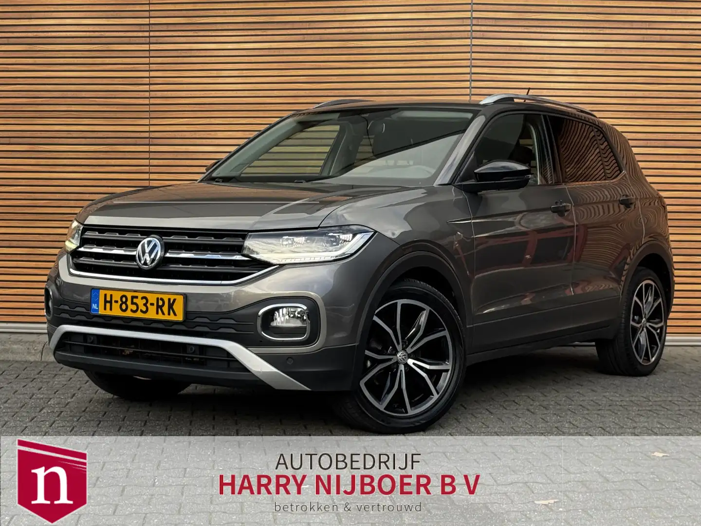 Volkswagen T-Cross 1.0 TSI Style Parkeerhulp V+A / Carplay / Navigati Grigio - 1