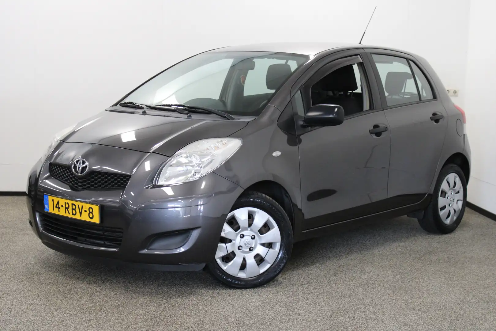 Toyota Yaris 1.3 VVTi Comfort Grijs - 1