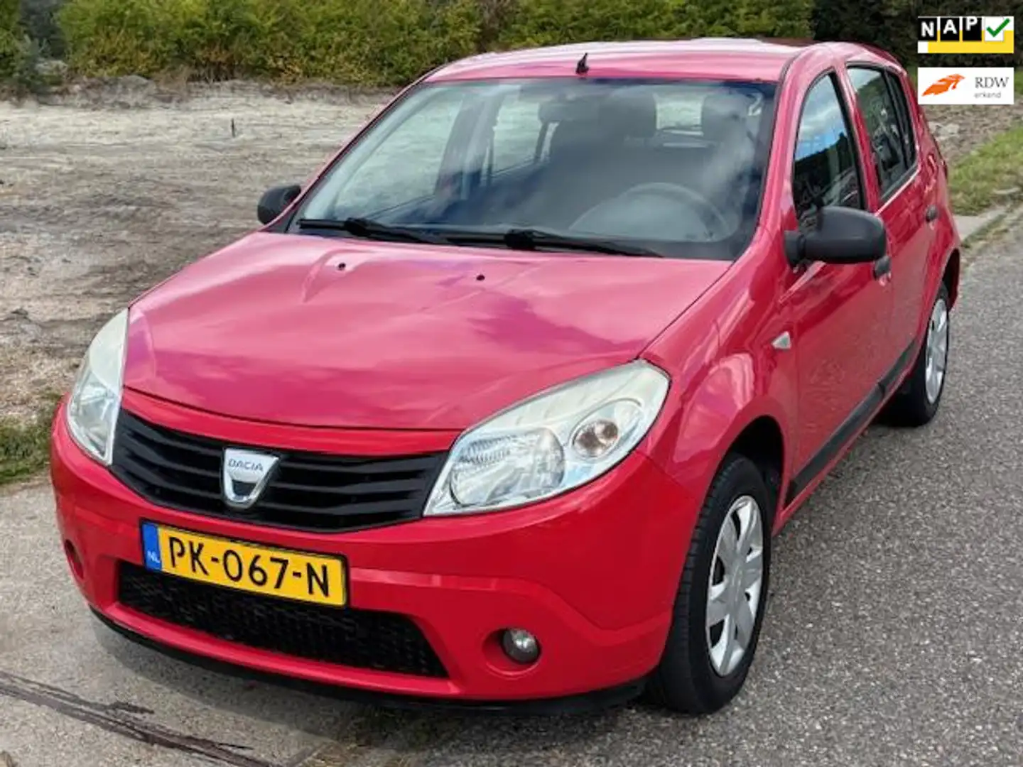 Dacia Sandero 1.2 5-Drs Audio/CD Getint glas Colorpakket ABS 2 x Rouge - 1