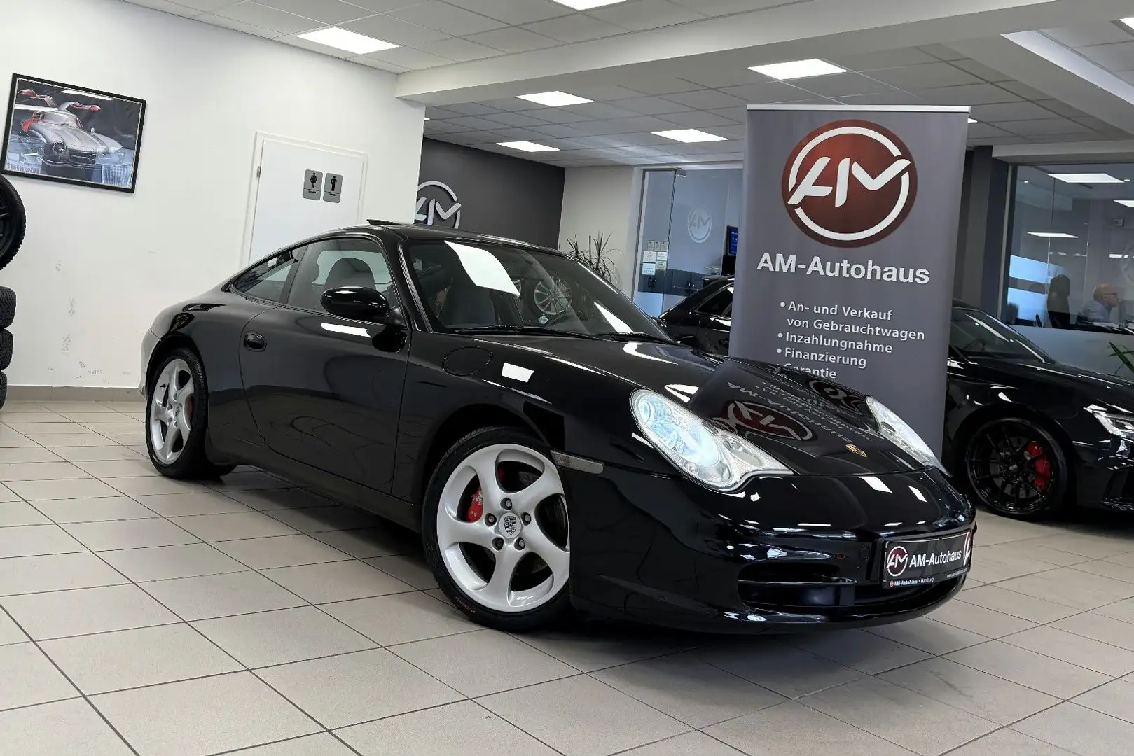 Porsche 996 Carrera 4 Coupé *Bi-Xenon*Navi*Memory*Leder* Noir - 1