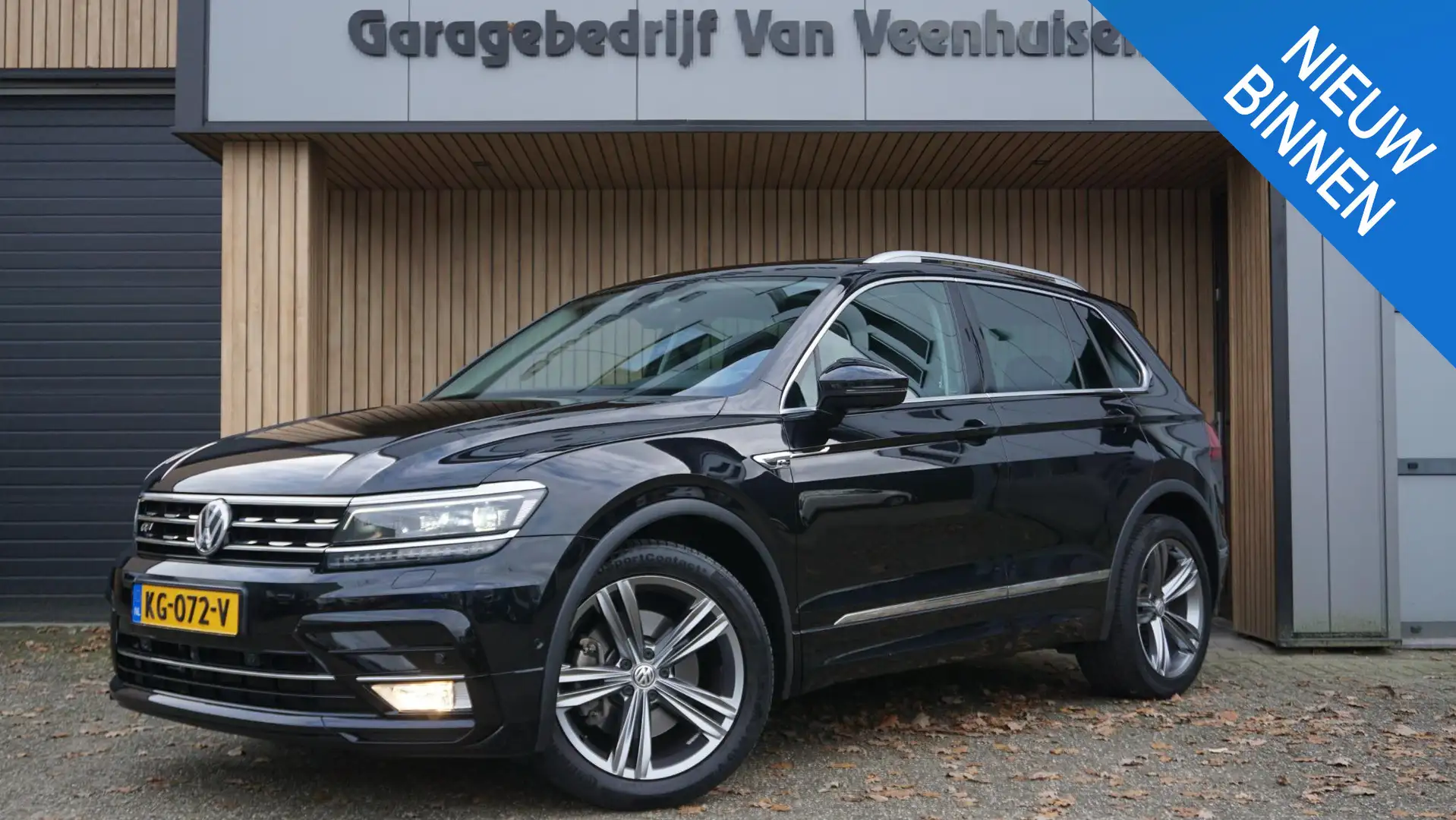 Volkswagen Tiguan 2.0 TSI 180pk DSG 4Motion R-Line & Highline Pano.D Zwart - 1