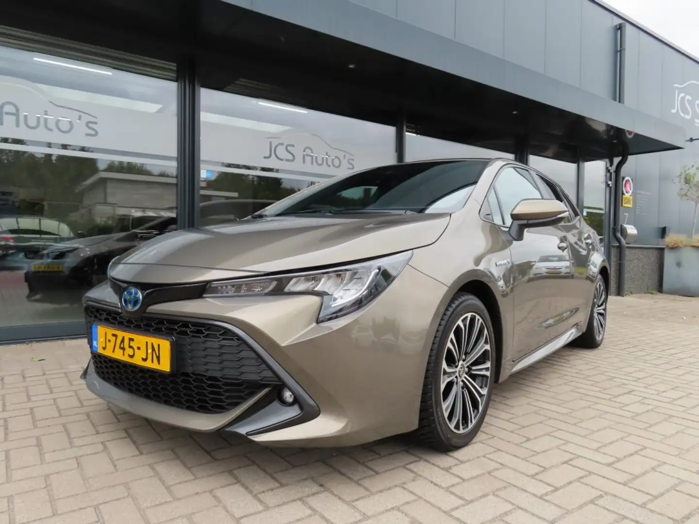 Toyota Corolla 1.8 Hybrid Bns Plus Ecc Led Navi Trekhaak 2020 Grün - 1
