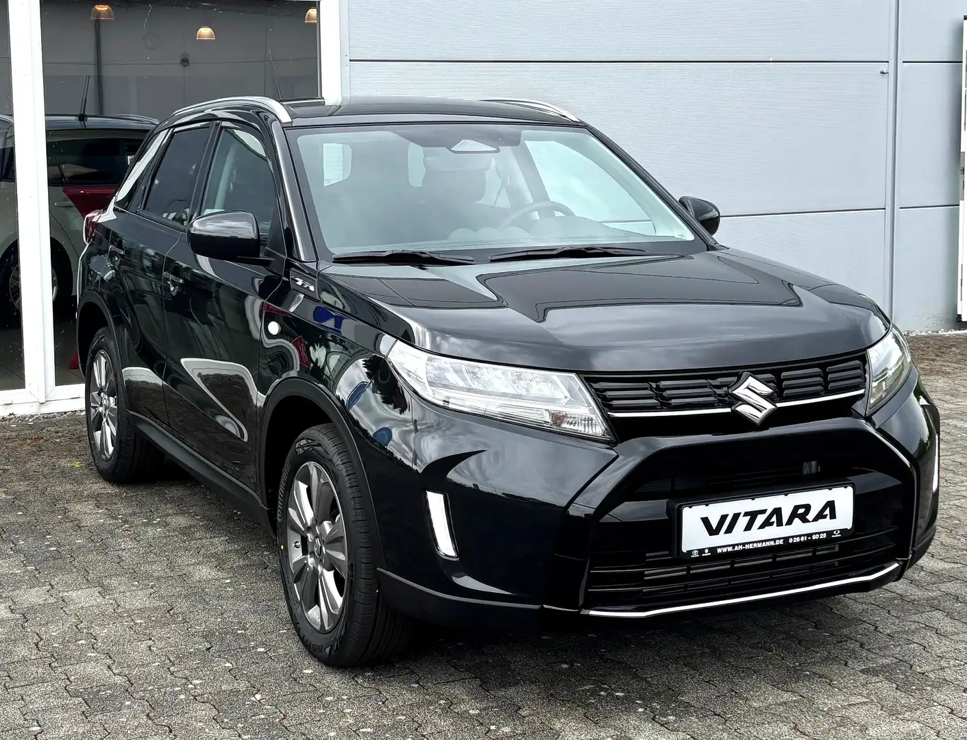 Suzuki Vitara 1.4 Comfort ALLGRIP Hybrid 4x4 NAVI KAMERA SITZHZ. Zwart - 1