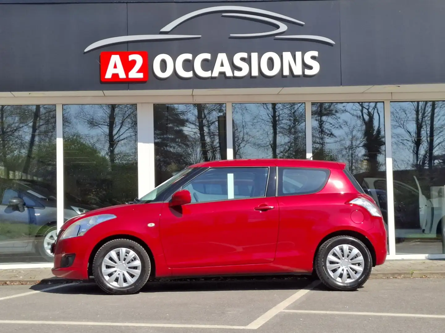 Suzuki Swift 1.2 95pk Airco/All season banden Rood - 2
