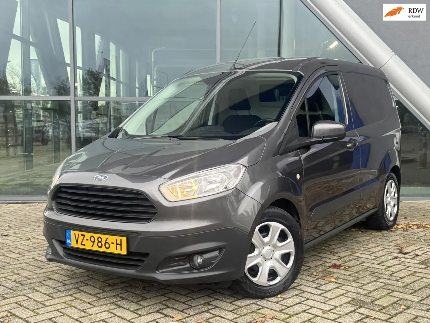 Ford Transit Courier 1.0 Trend 101pk Navigatie / Cruise Control / 1e Ei Grijs - 1