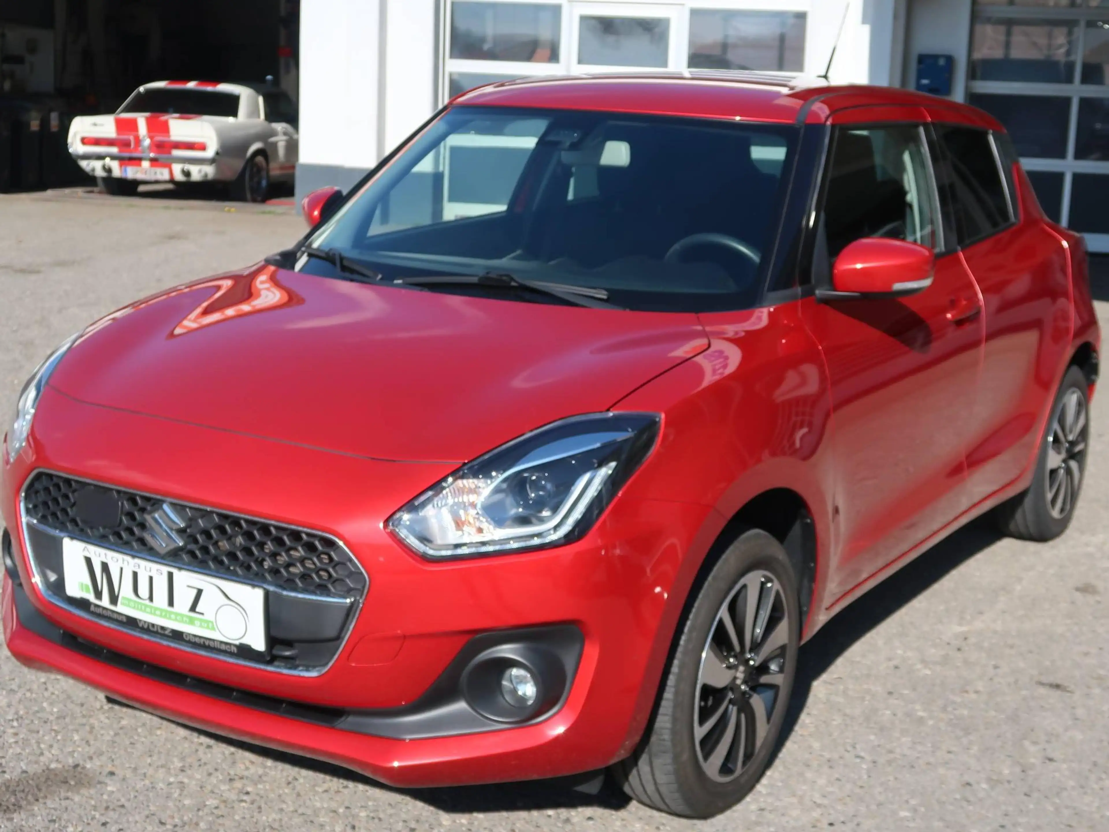 Suzuki Swift 1,2 DualJet Hybrid Allgrip Flash + Winterräder — photo 7
