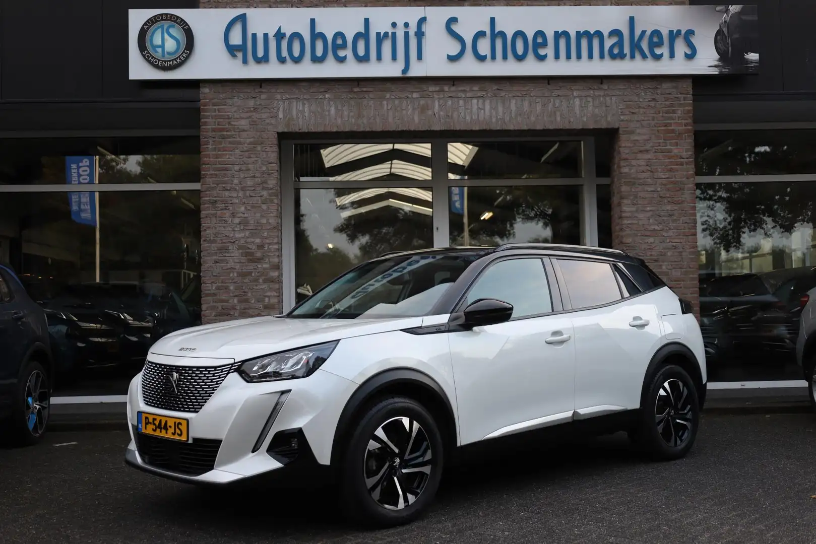 Peugeot e-2008 EV Allure Première 3-FASEN!! 2xPDC CAMERA CARPLAY Wit - 1