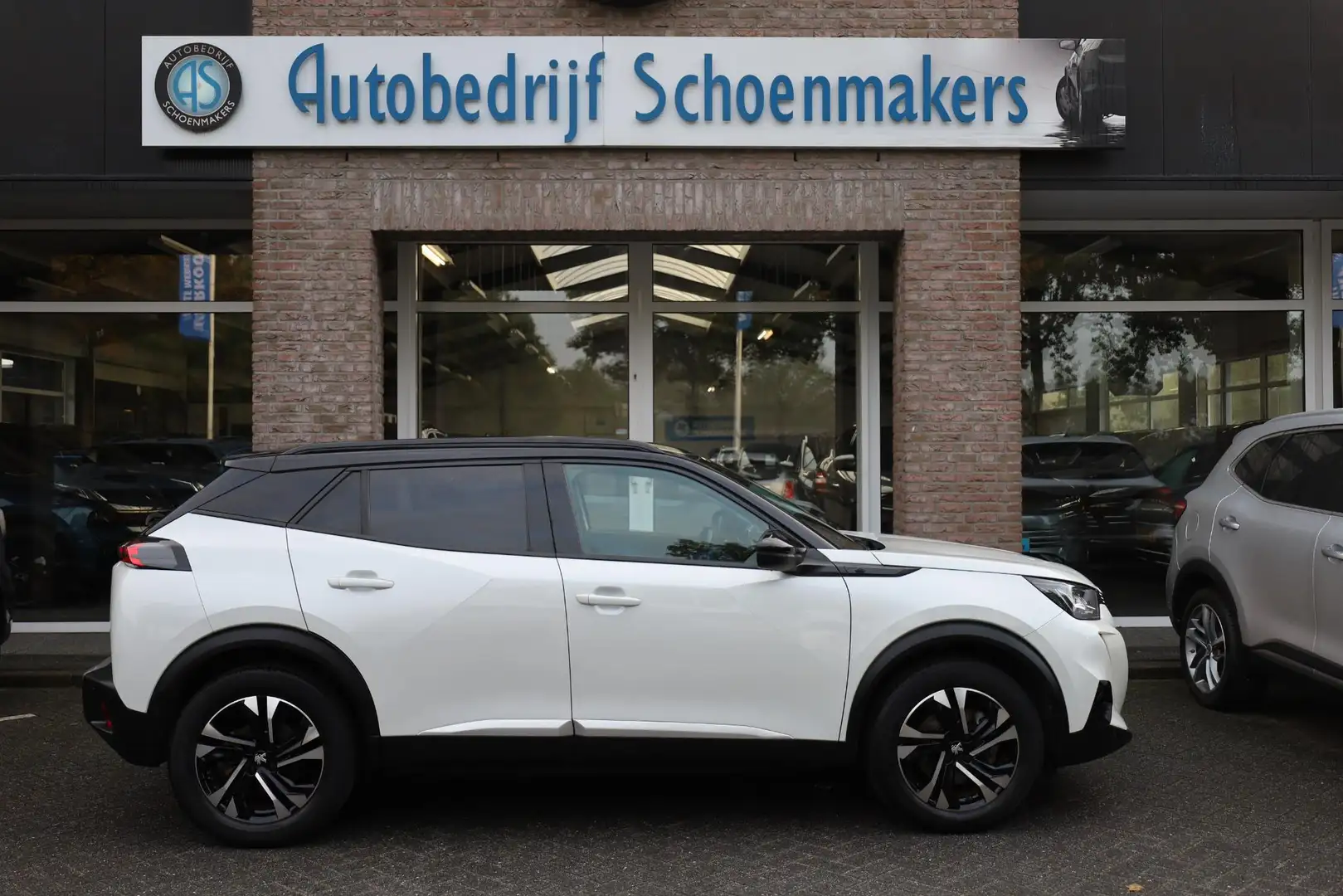 Peugeot e-2008 EV Allure Première 3-FASEN!! 2xPDC CAMERA CARPLAY Wit - 2