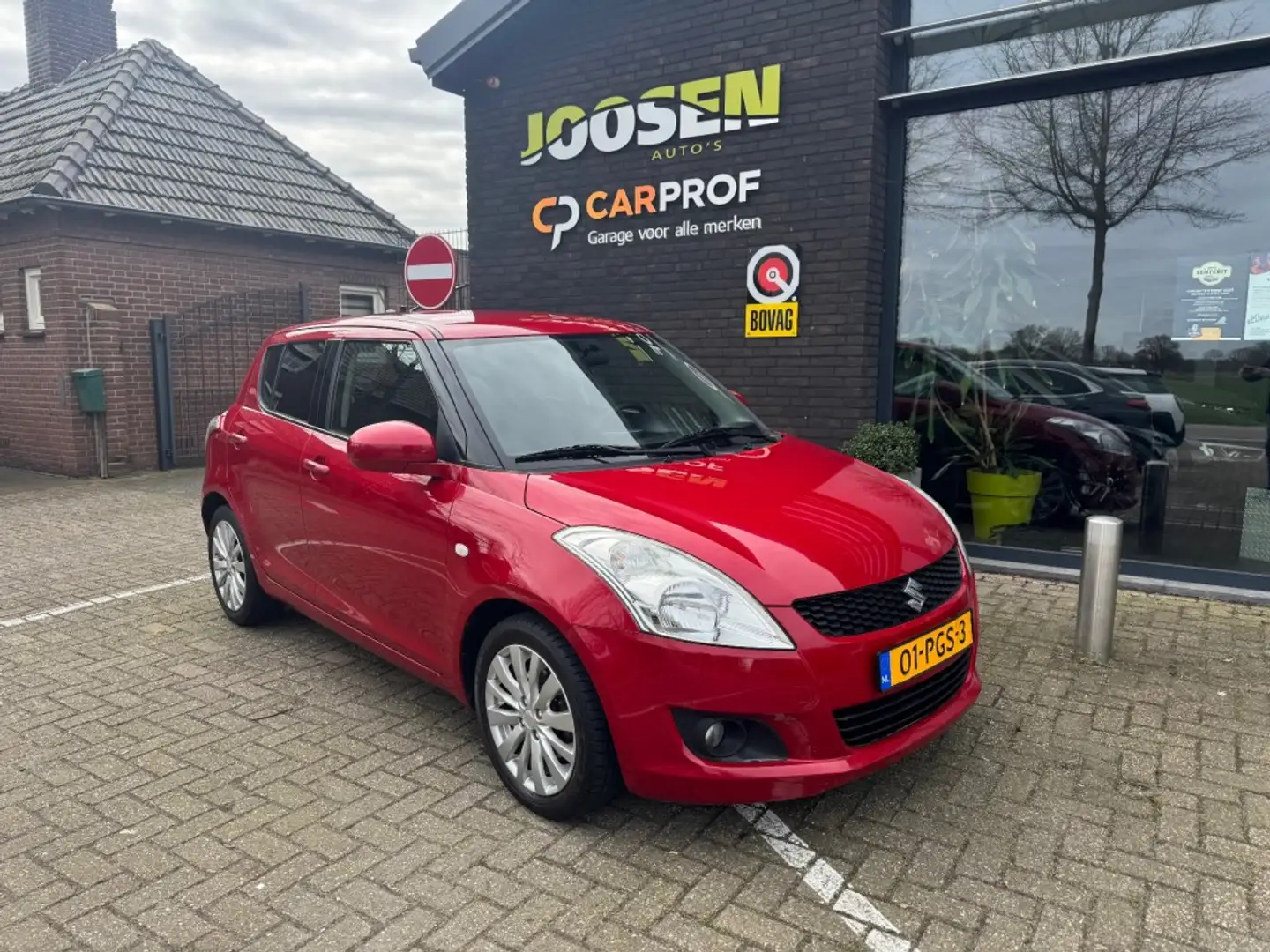 Suzuki Swift 1.2 EXCLUSIVE EASSS Rojo - 1