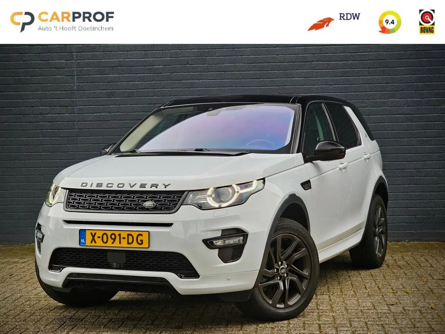 Land Rover Discovery Sport 2.0 Si4 Anniversary 4x4 / Panorama dak/verwarmde v Blanc - 1