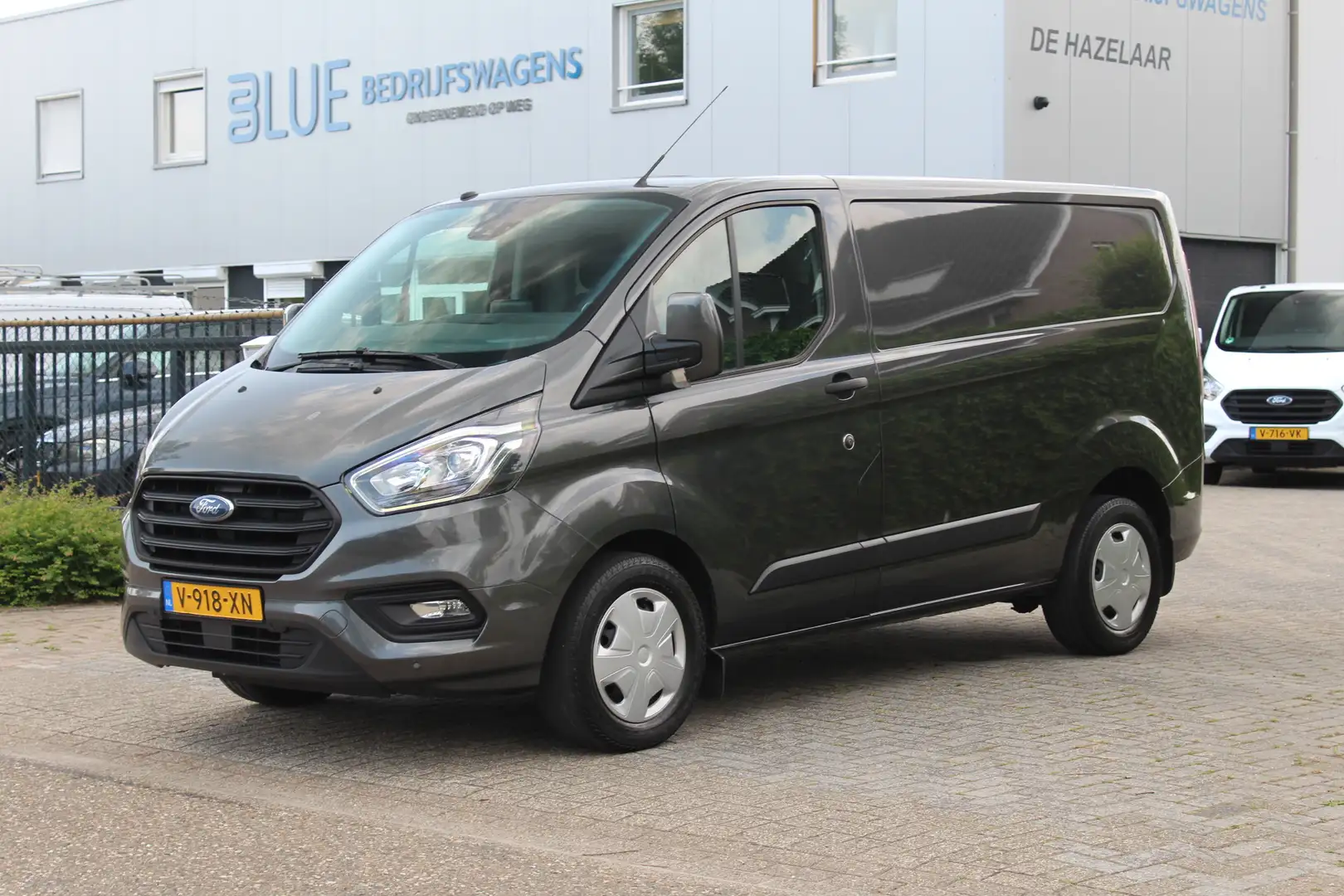 Ford Transit Custom 300 2.0 TDCI 130PK Euro6 Automaat Trend ✓ Led ✓ na Gris - 1