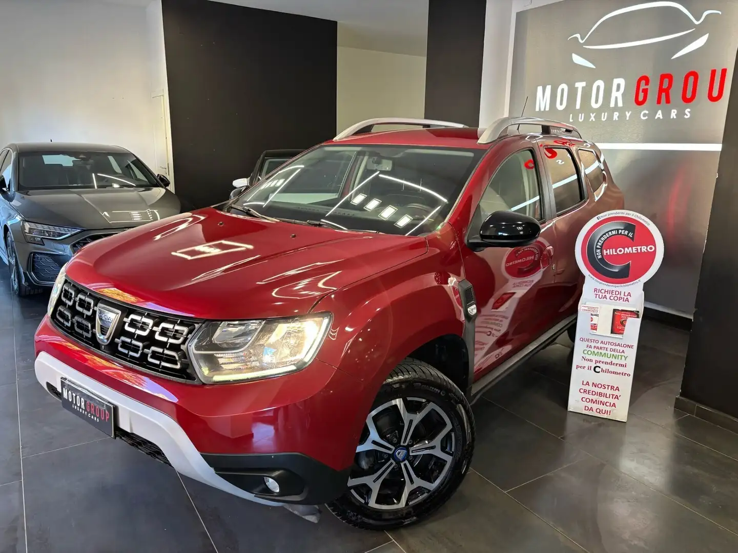 Dacia Duster 1.0 TCe 100 CV ECO-G 4x2 Prestige Rood - 1