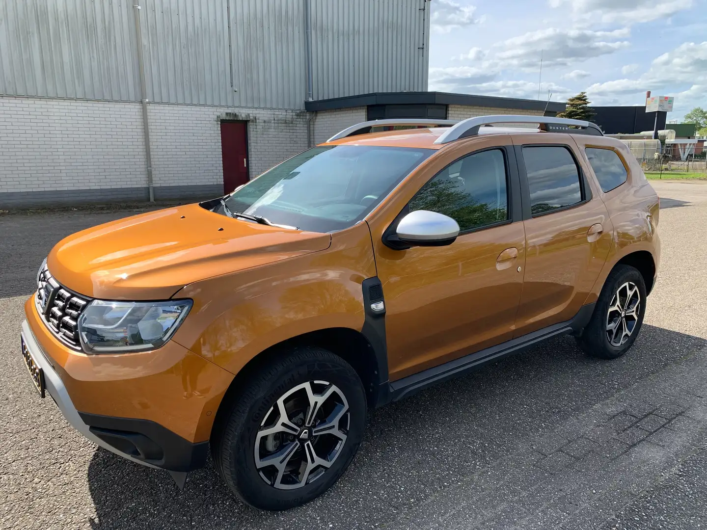 Dacia Duster 1.0 TCe BiF Comfort Oranje - 1