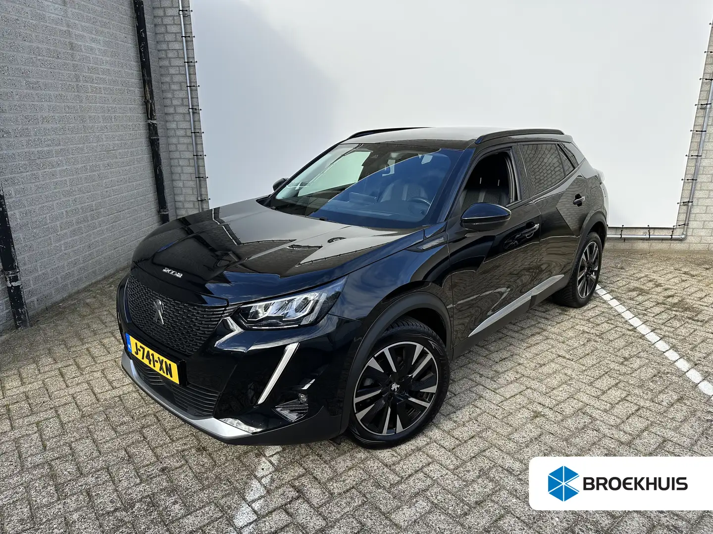 Peugeot 2008 1.2 PureTech Allure | Achterbank in delen neerklap Noir - 1