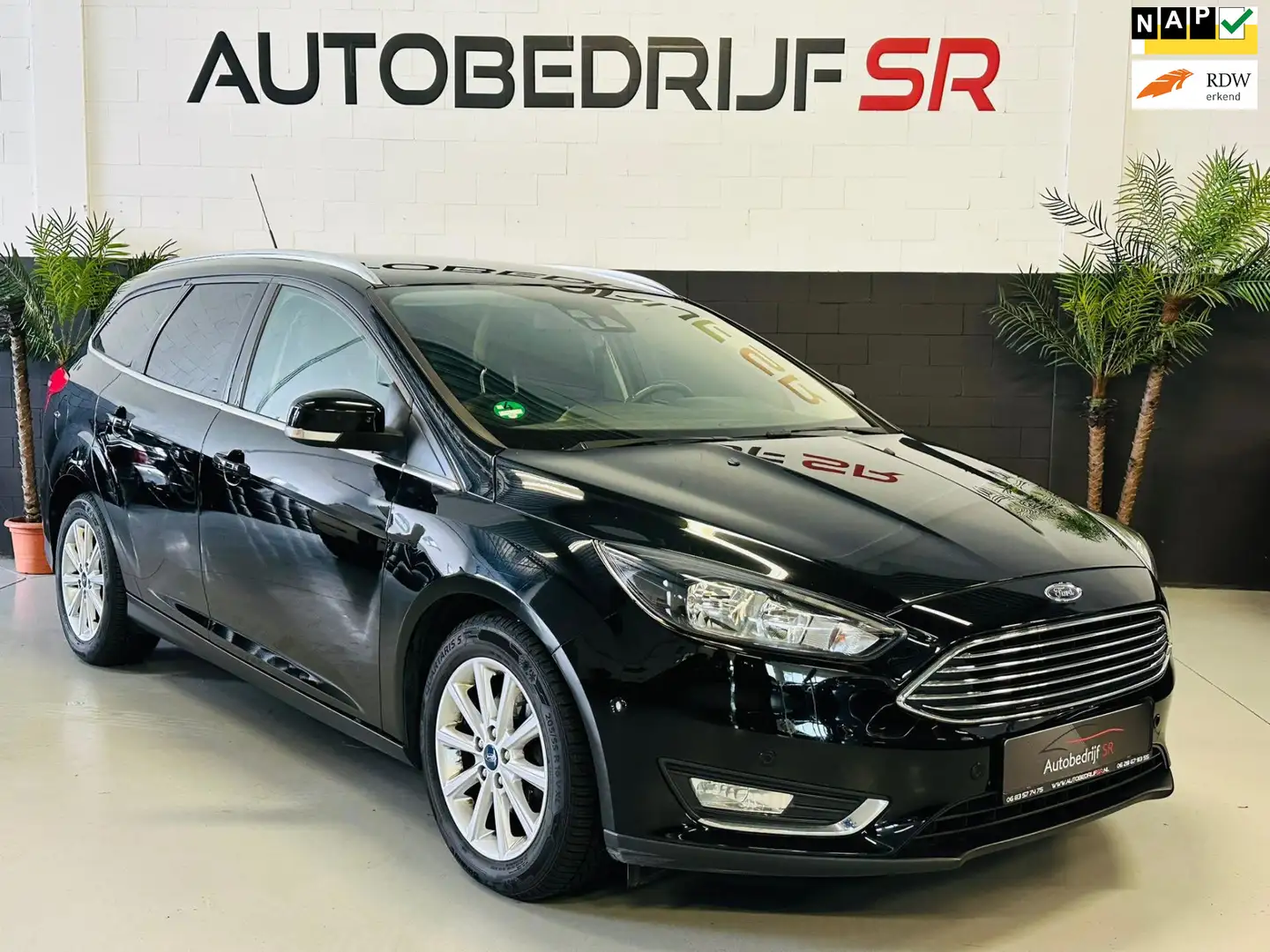 Ford Focus Wagon 1.0 Titanium Lane Assist! Navigatie! Cruise - 1