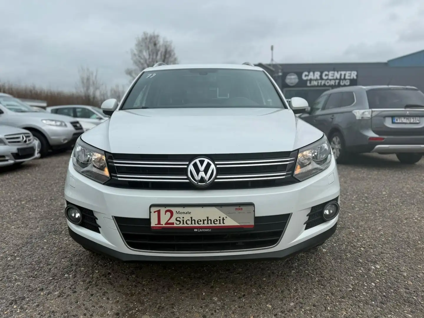 Volkswagen Tiguan Lounge Sport&Style BMT 1.4 TSI/NAVi/PANO/ Weiß - 1