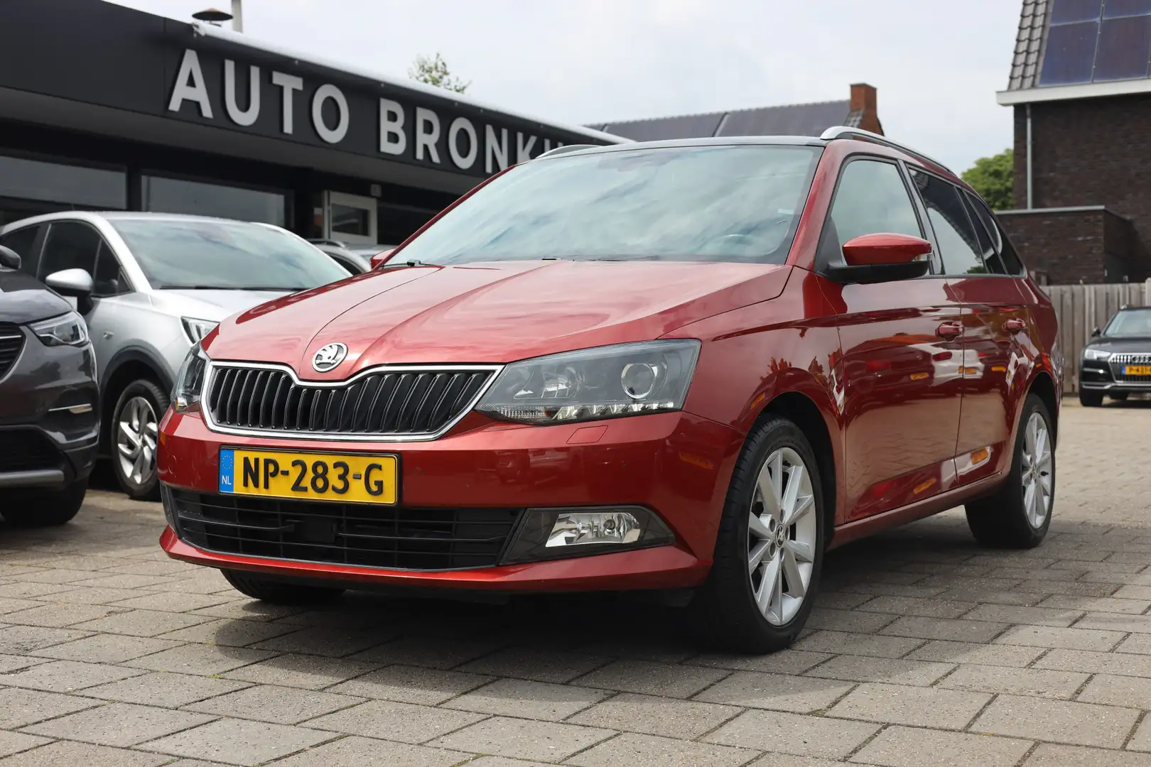 Skoda Fabia Combi 1.2 TSI STYLE BUSINESS | AUT | NAVI | PANO Rood - 1