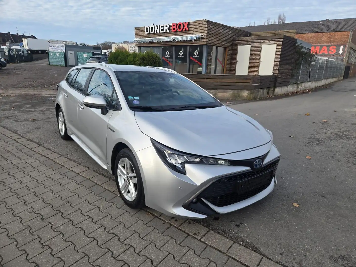 Toyota Corolla 1.8 Hydrid 1.Hand/Kamera/SHZ/NAVI/PDC 72 kW (98... Plateado - 1