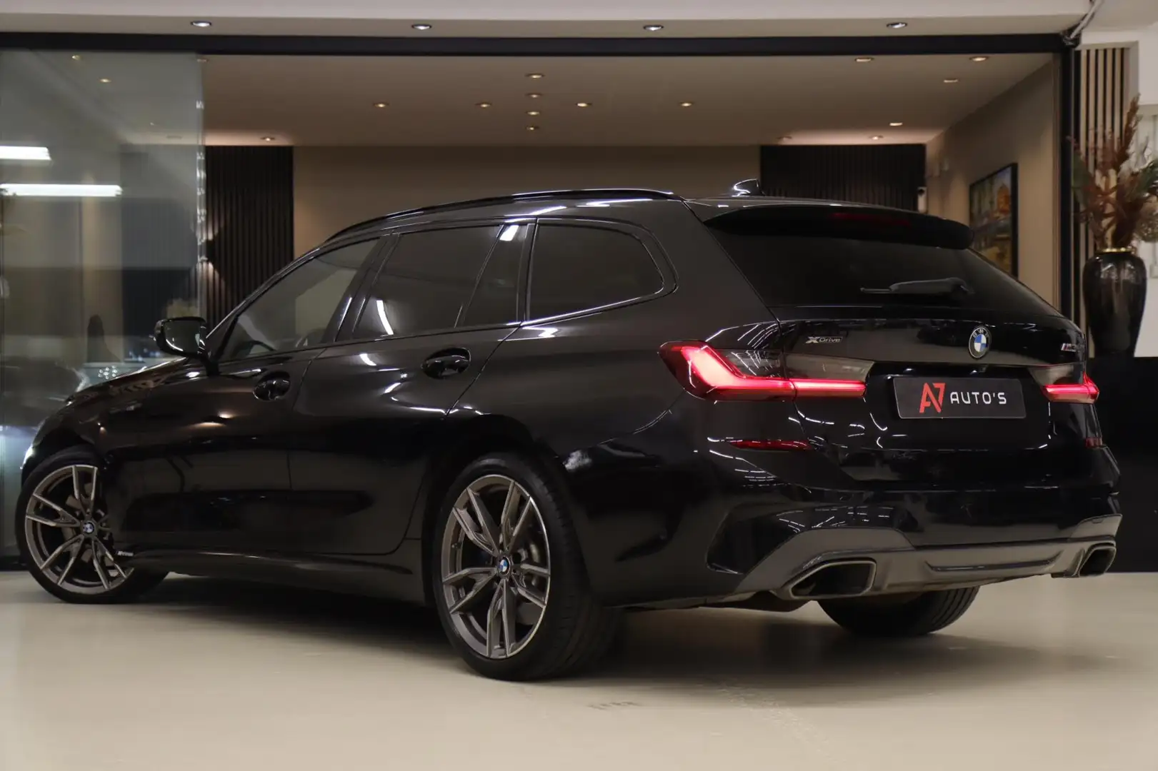 BMW 340 3-serie Touring M340i xDrive High Executive Pano/H Zwart - 2