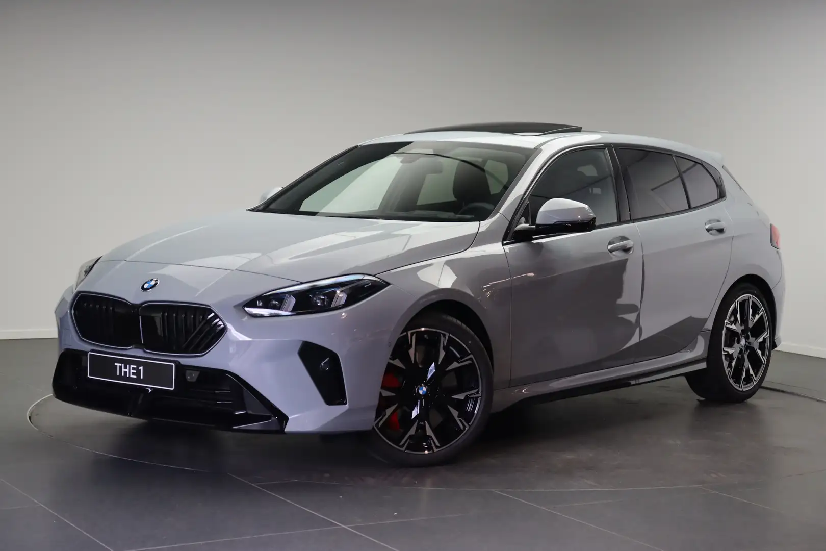 BMW 120 1 Serie High Executive M Sport Automaat / Panorama Grijs - 1