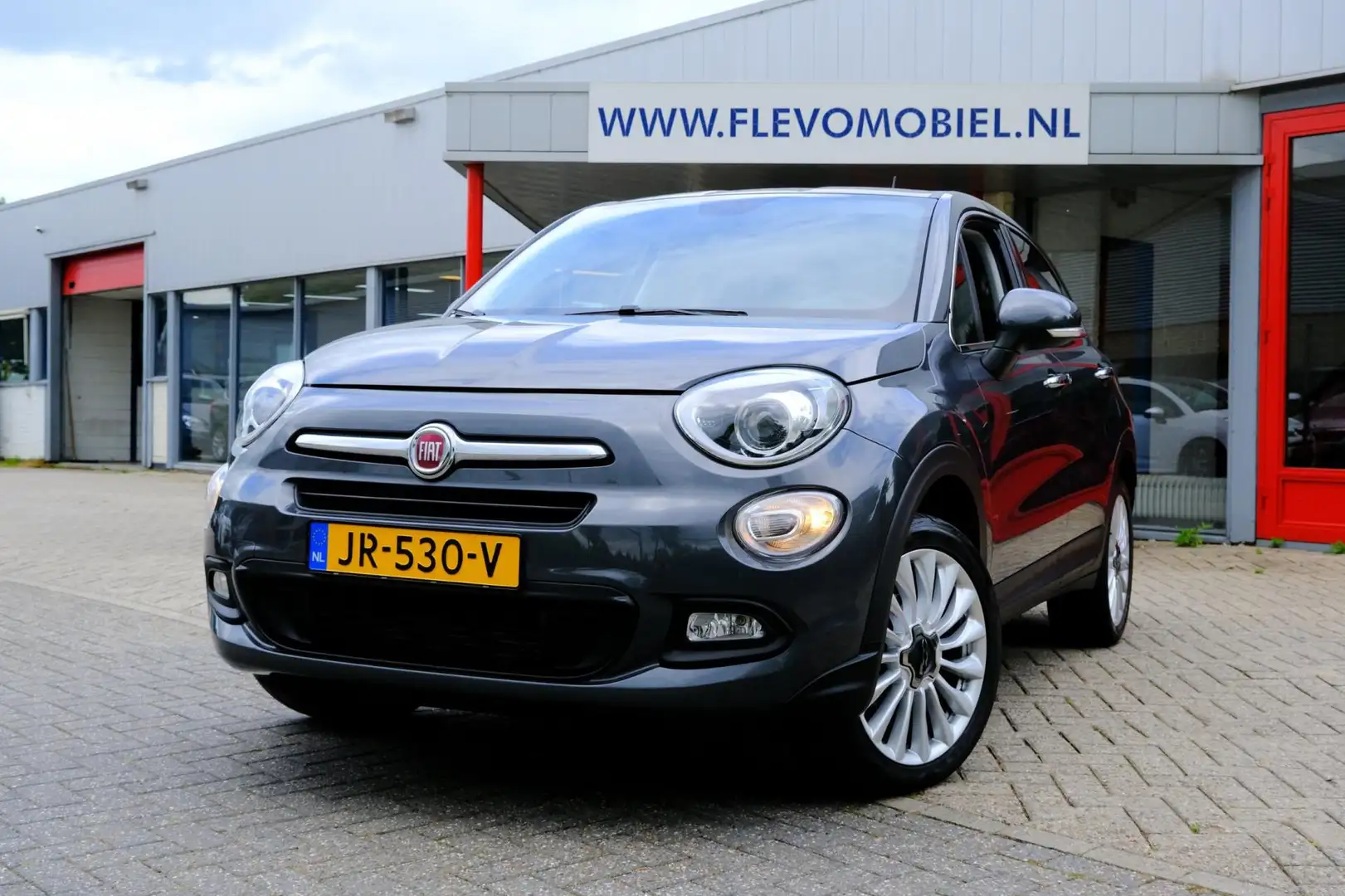 Fiat 500X 1.4 Turbo MultiAir Lounge Aut. Navi|Clima|Xenon|PD Grijs - 1
