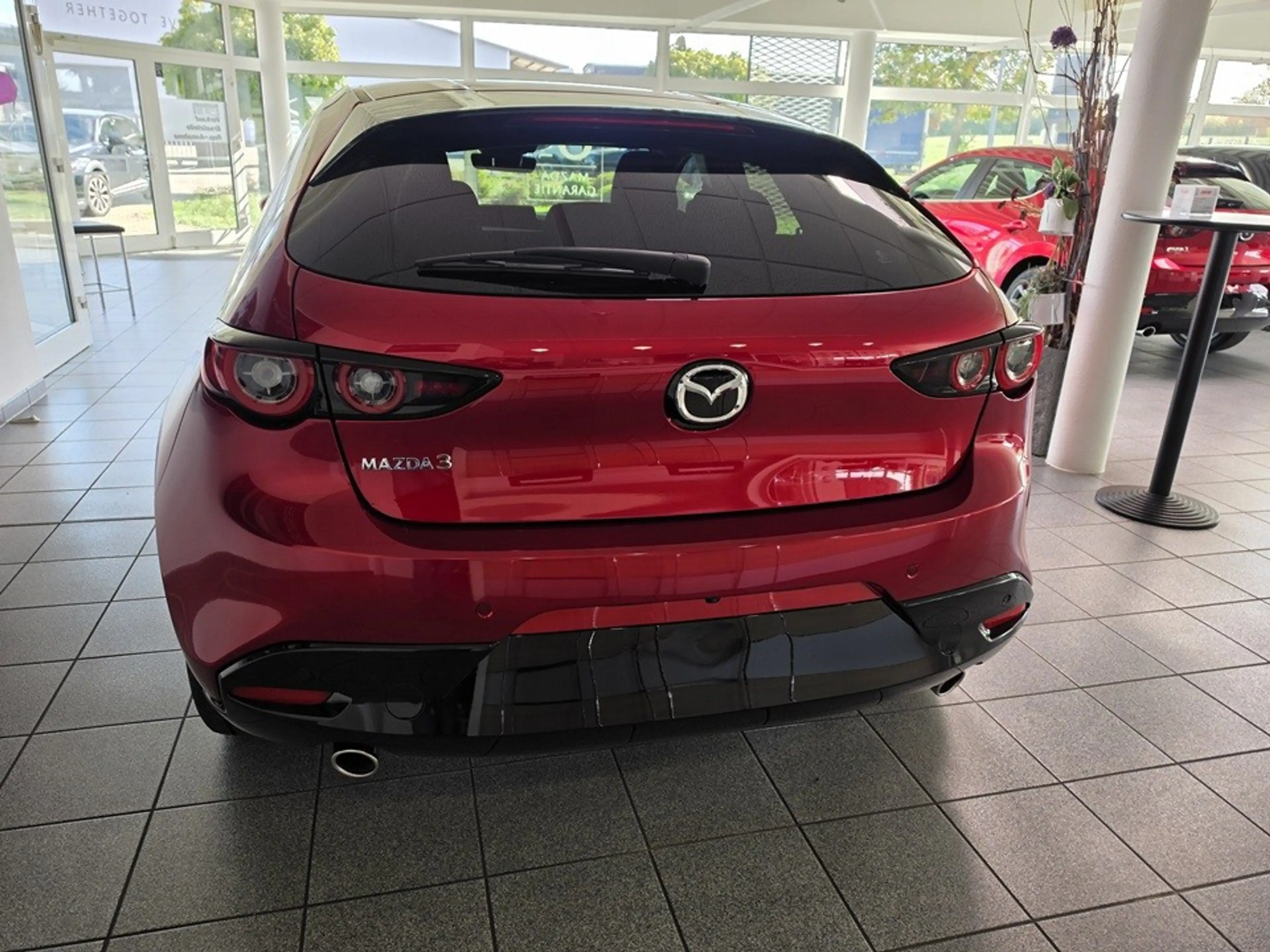 Mazda 3 e-SKY G 140 PS 6AT FWD Exclusive-Line — photo 9