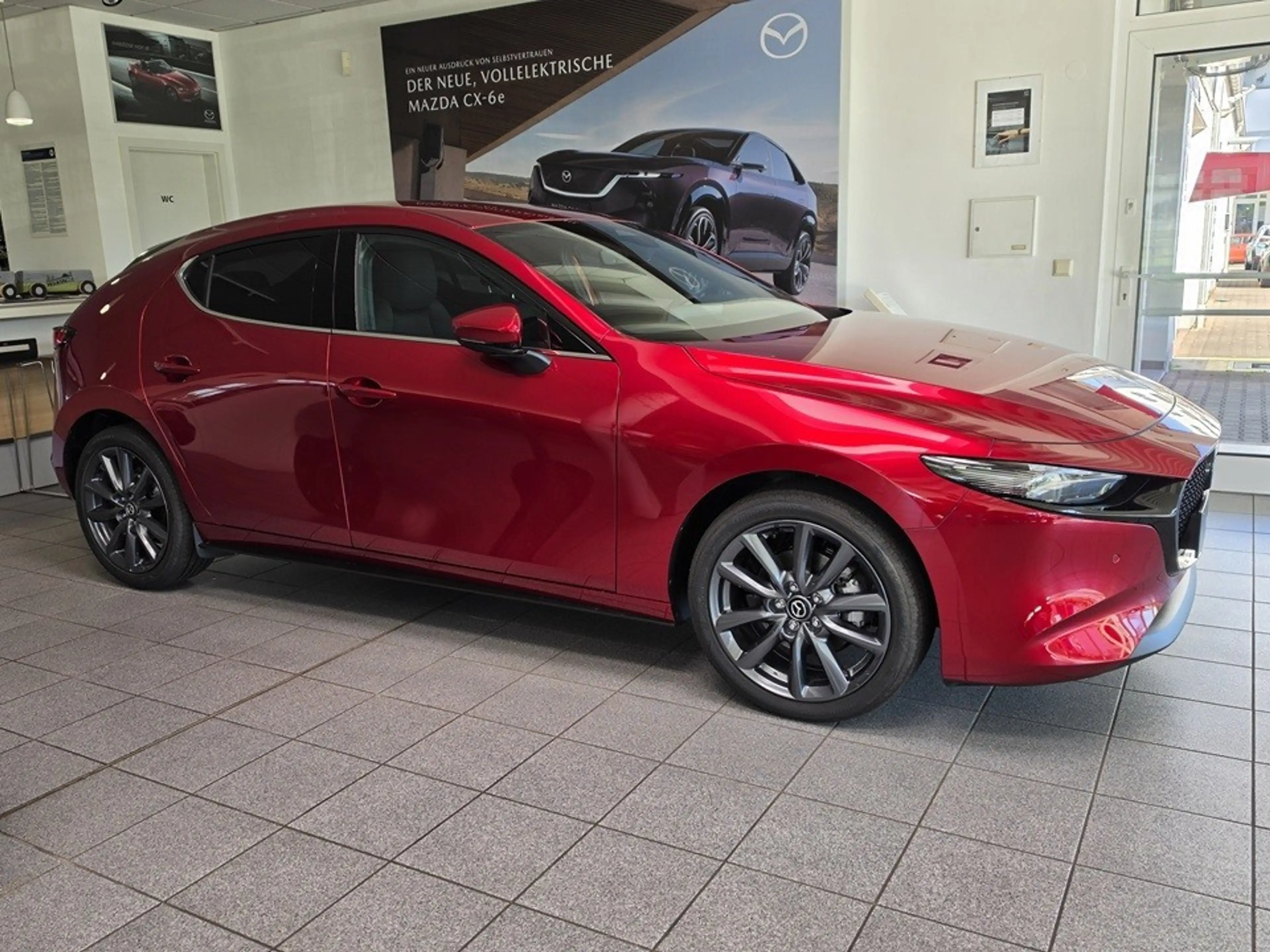 Mazda 3 e-SKY G 140 PS 6AT FWD Exclusive-Line — photo 6
