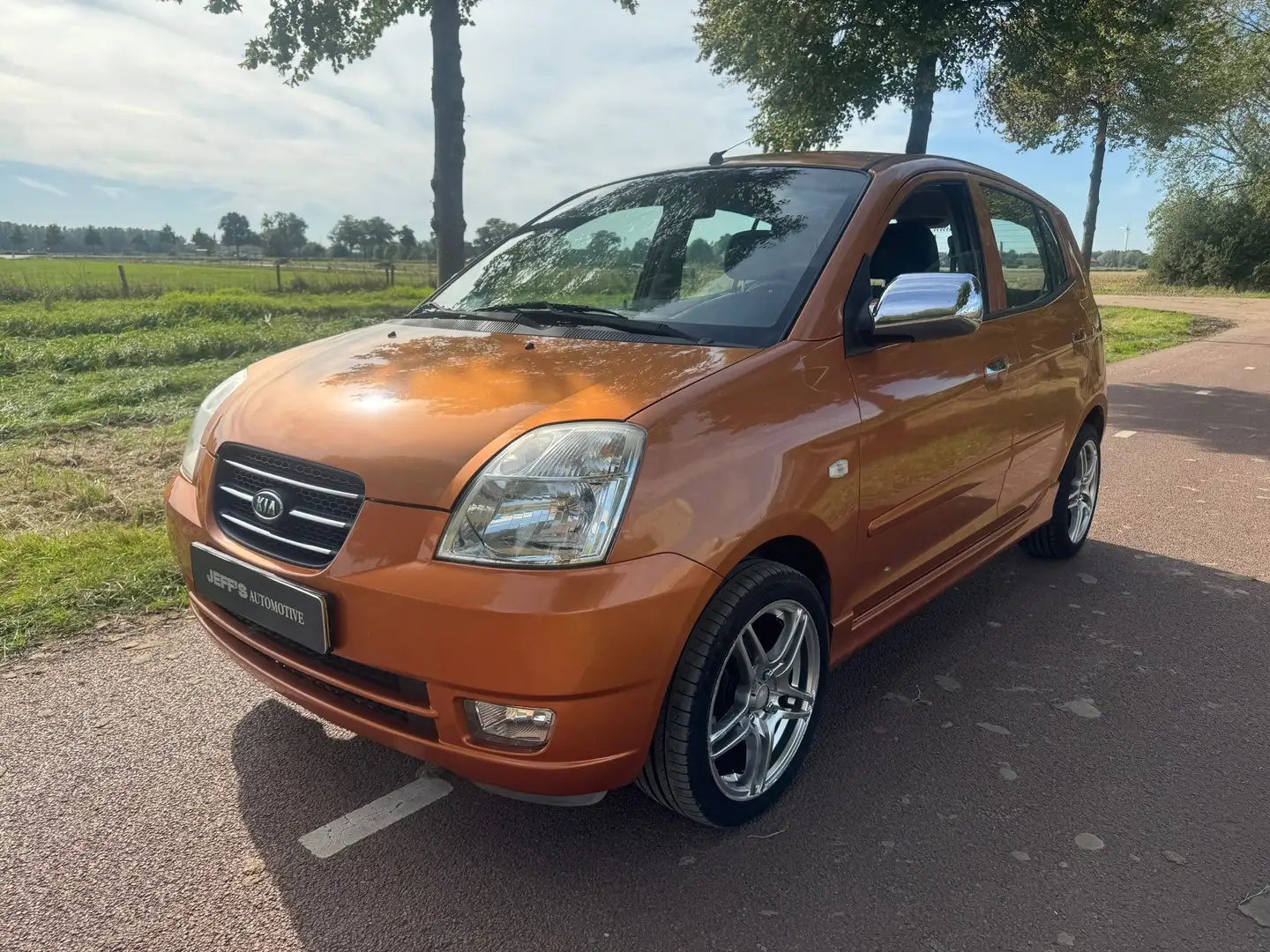 Kia Picanto 1.0 Bling Oranje - 1