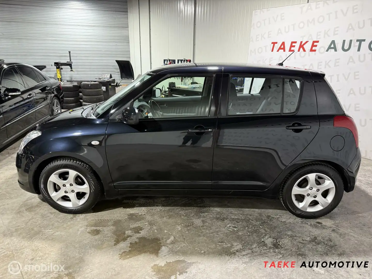 Suzuki Swift 1.3 GA Airco/Apk/Nap Zwart - 2