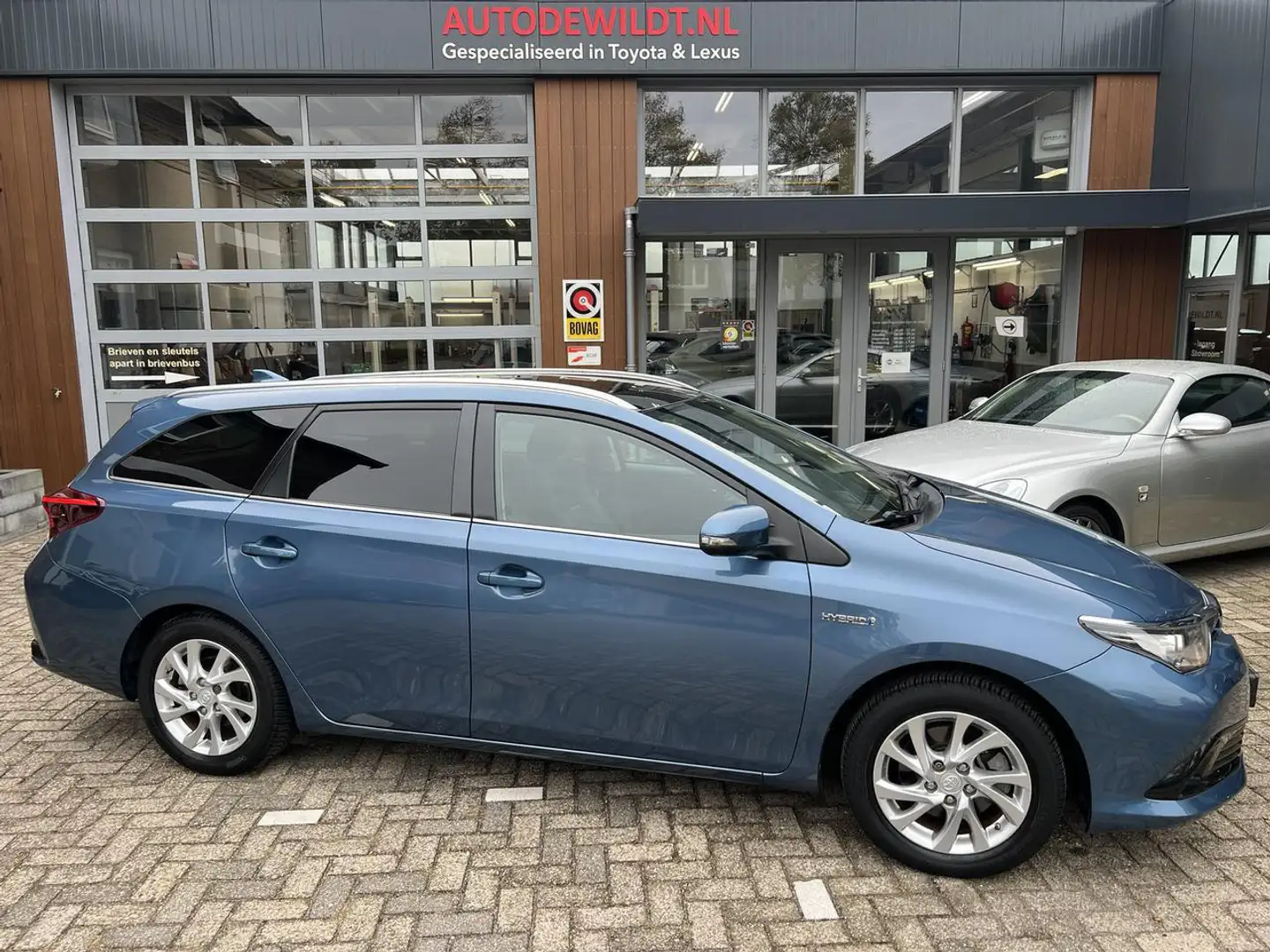 Toyota Auris TS 1.8 Hybrid Business A/T + NIEUWE APK Bleu - 1