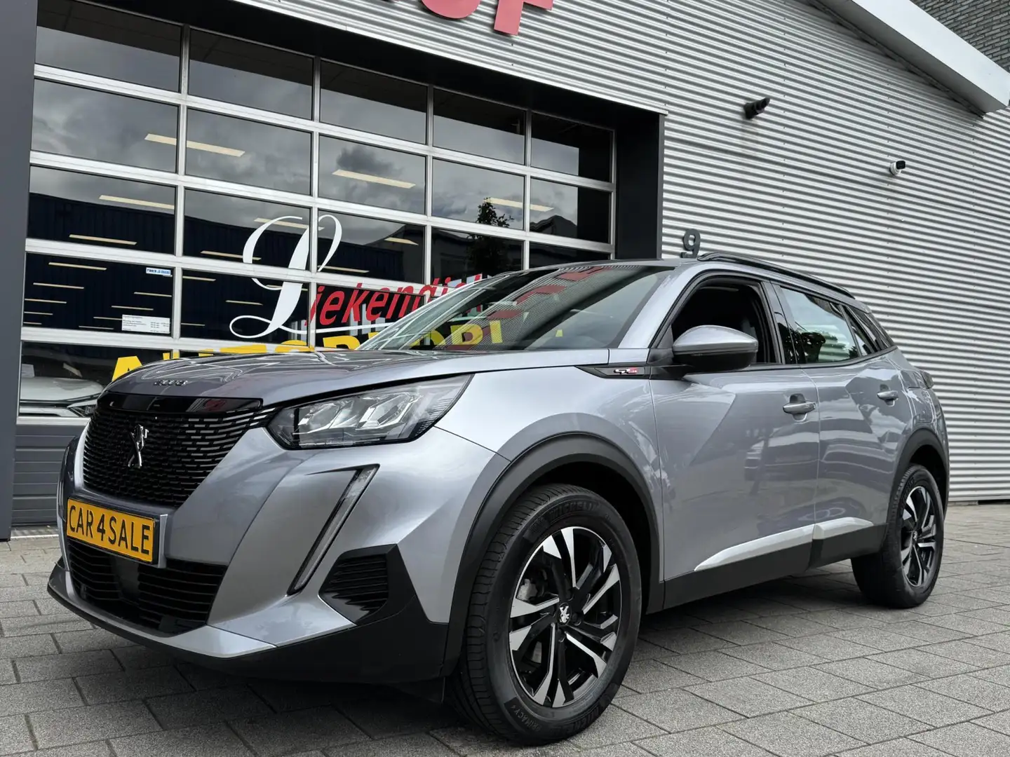 Peugeot 2008 1.2 PT GT-line Allure 131PK - Navigatie I LED/PDC Grijs - 1