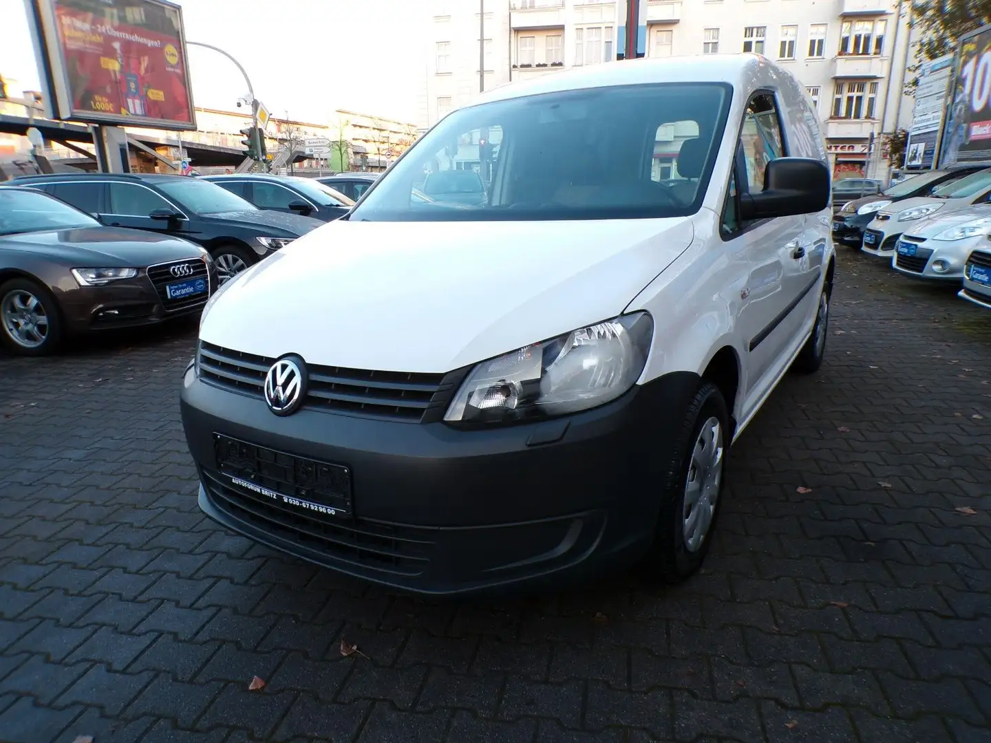 Volkswagen Caddy 1.2 mit AHK. 1-HAND Weiß - 1