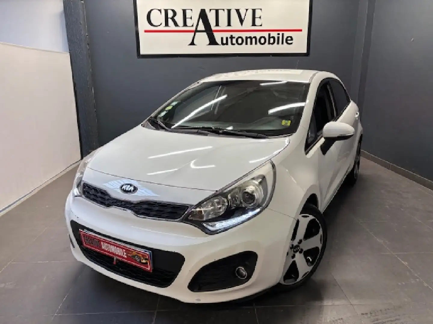 Kia Rio 1.4 CRDi 90 CV 1ERE MAIN - 1