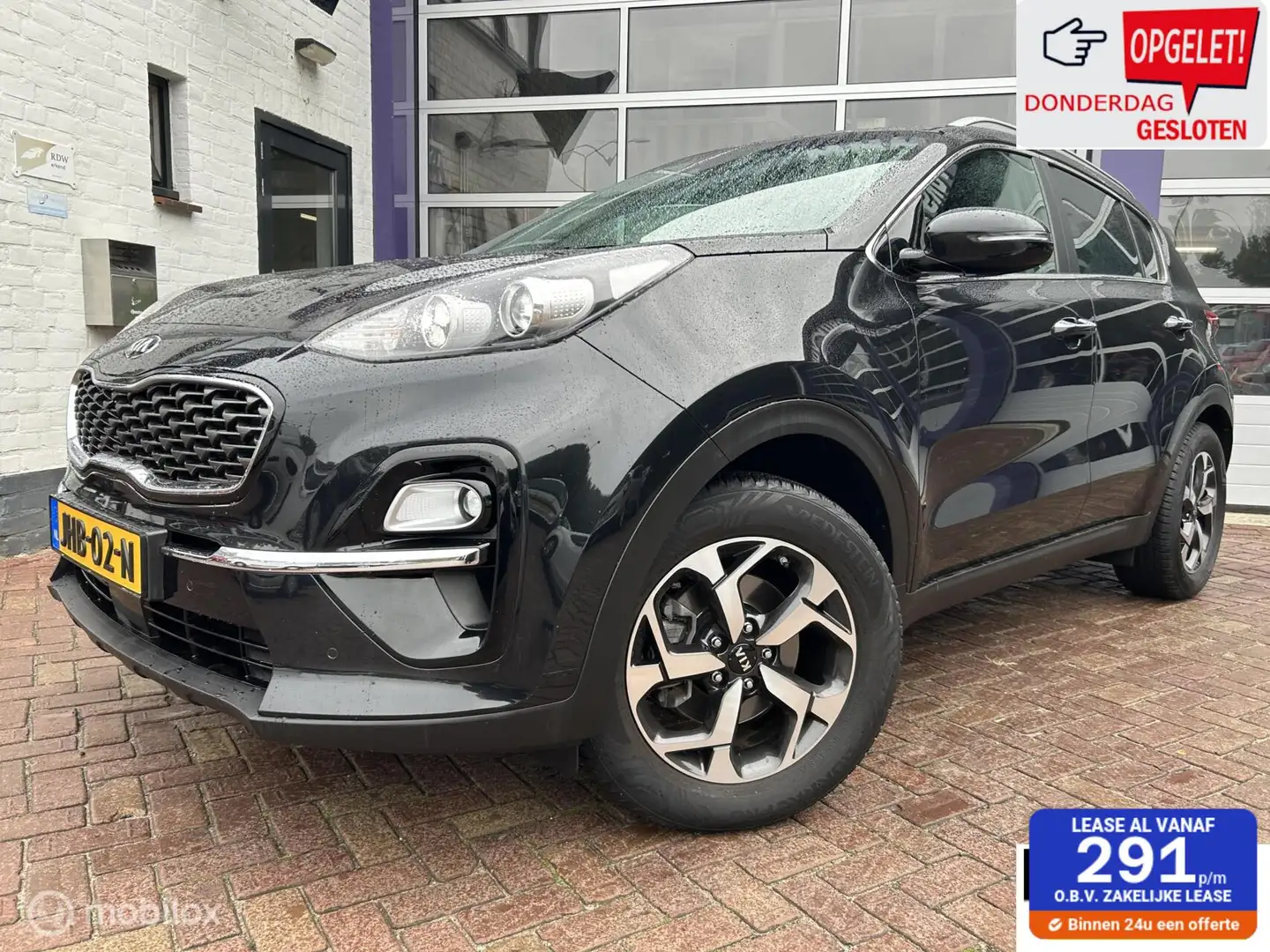 Kia Sportage 1.6 GDI DynamicLine * NAVI * TREKHAAK * LED * Zwart - 1