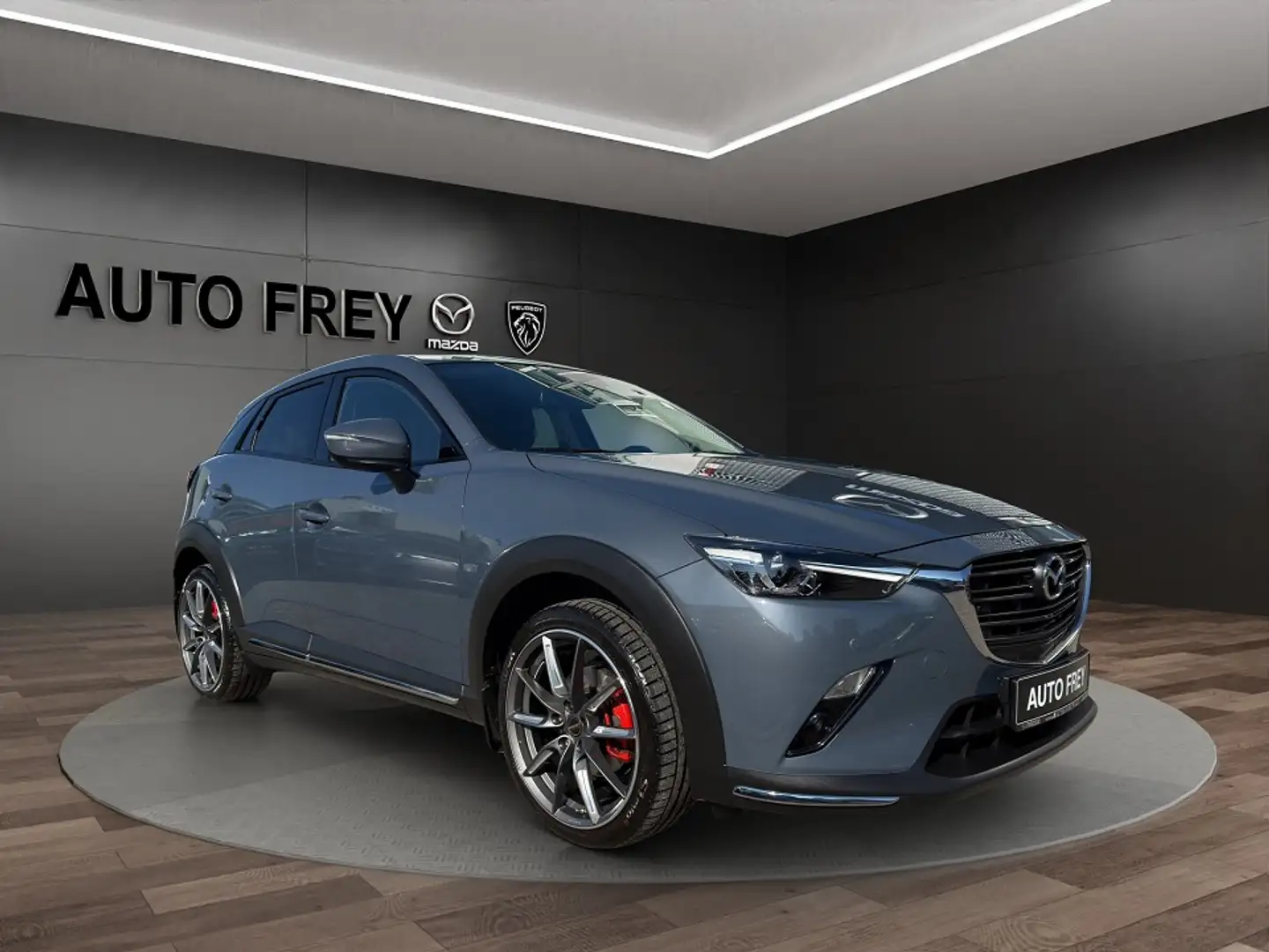 Mazda CX-3 121PS Selection DUK-P+ AHK+NAVI+KLIMA+KAMERA+LED+S Grijs - 1