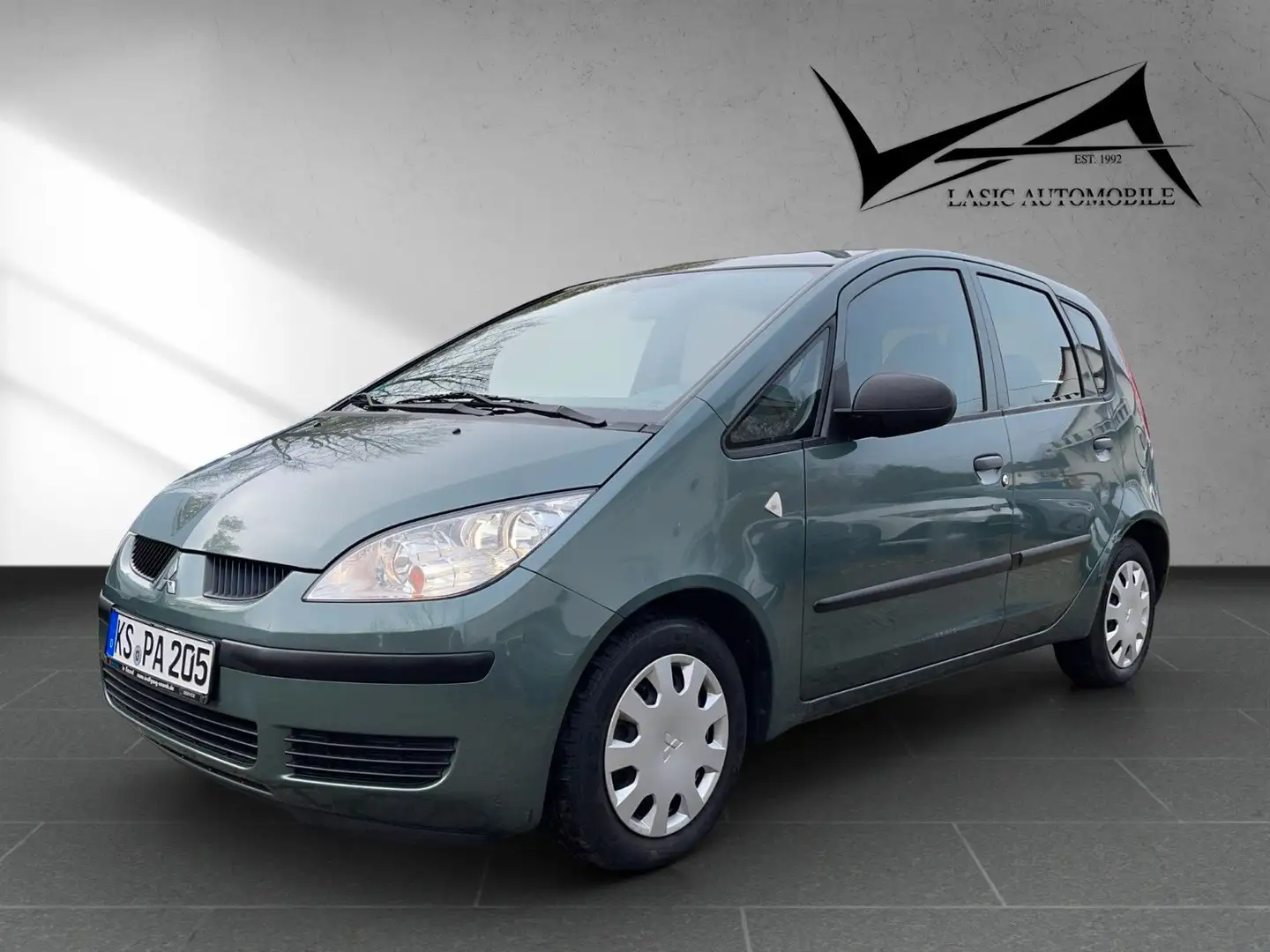 Mitsubishi Colt CZ3 Lim. 5-trg. 1.1 Inform Grün - 1