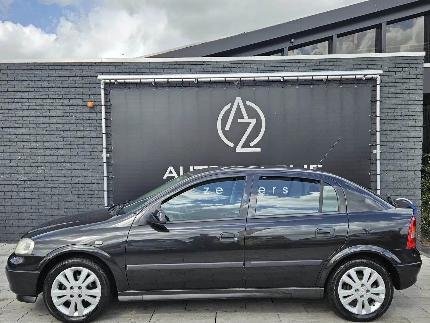 Opel Astra 1.6 Pearl *Airco* Schwarz - 1