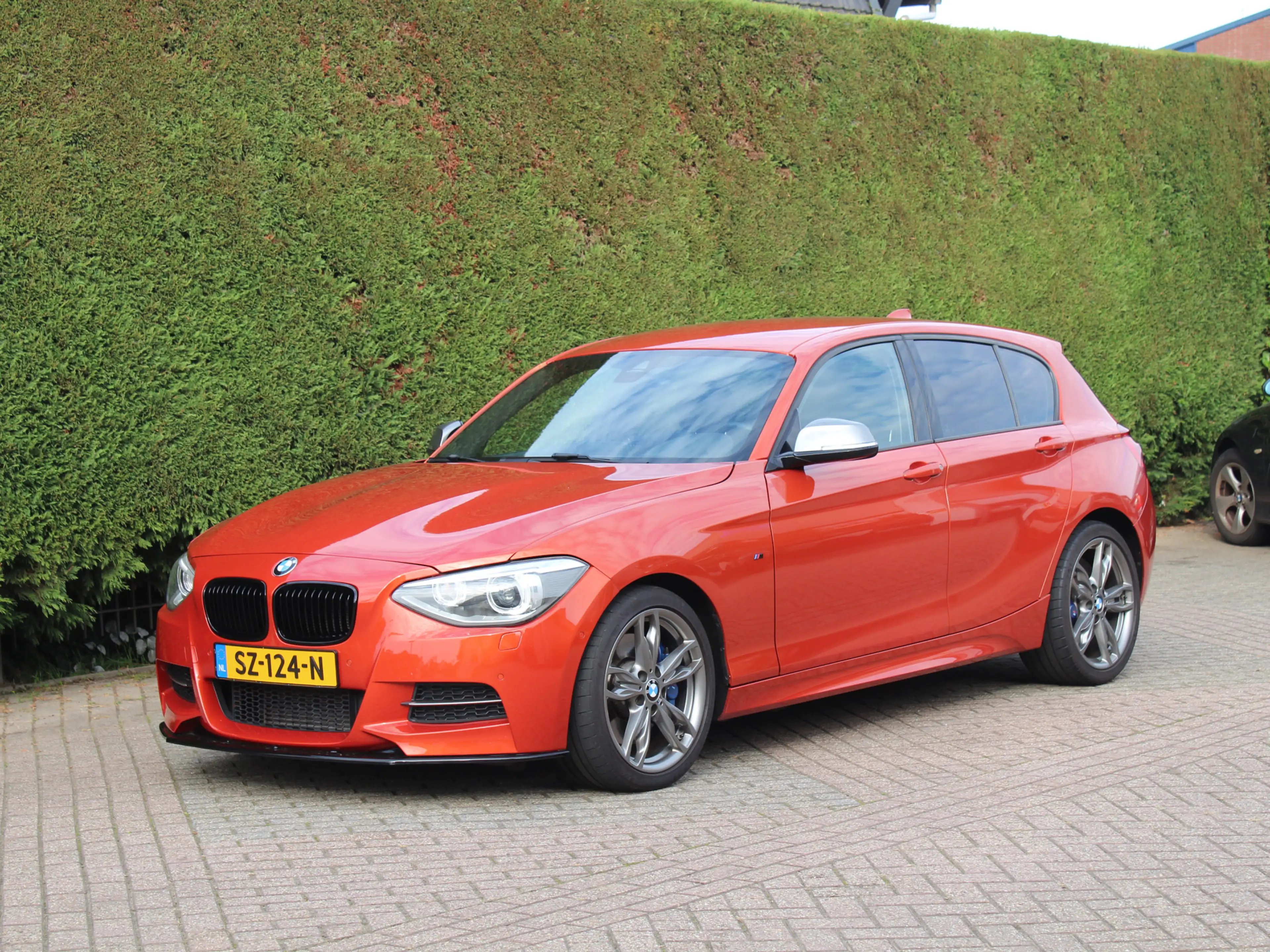 BMW 135 1-serie M135i xDrive High Executive | M Performanc — photo 3