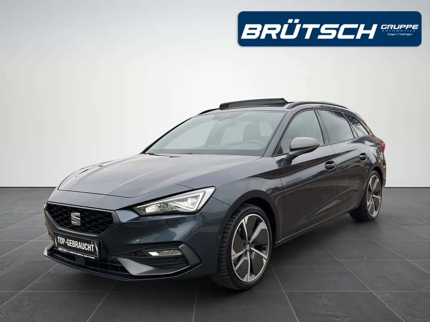 SEAT Leon Sportstourer 1.5 eTSI FR DSG / AHK / PANORAMA / AC Grau - 1