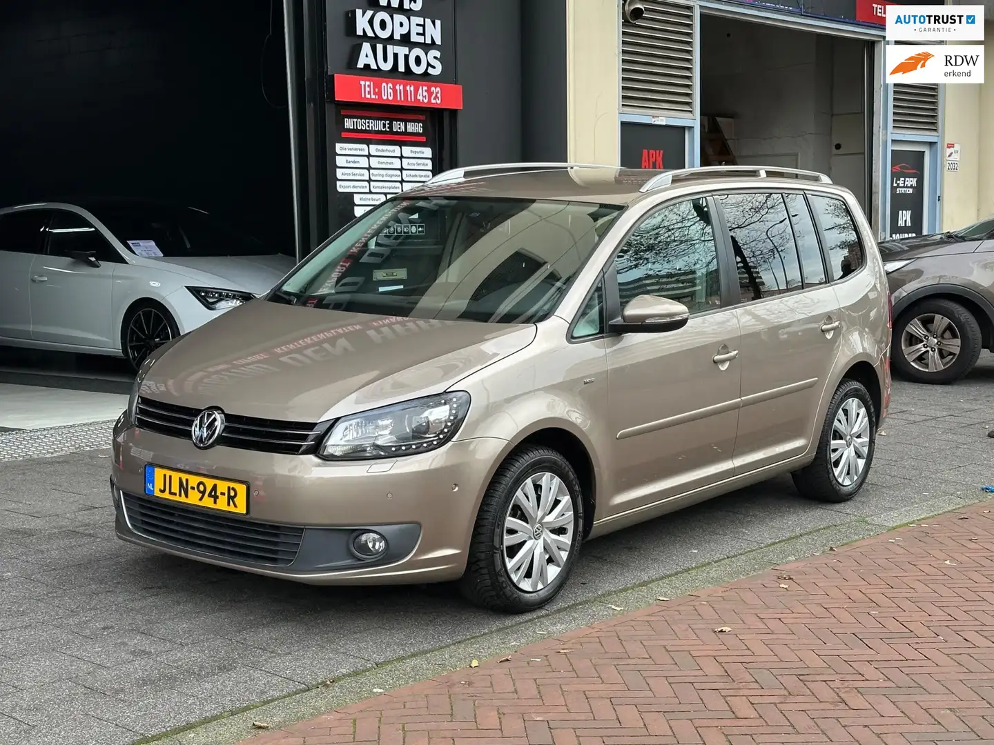 Volkswagen Touran 1.4 TSI Highline Aut Clima Stoelverwarming PDC Gelb - 1