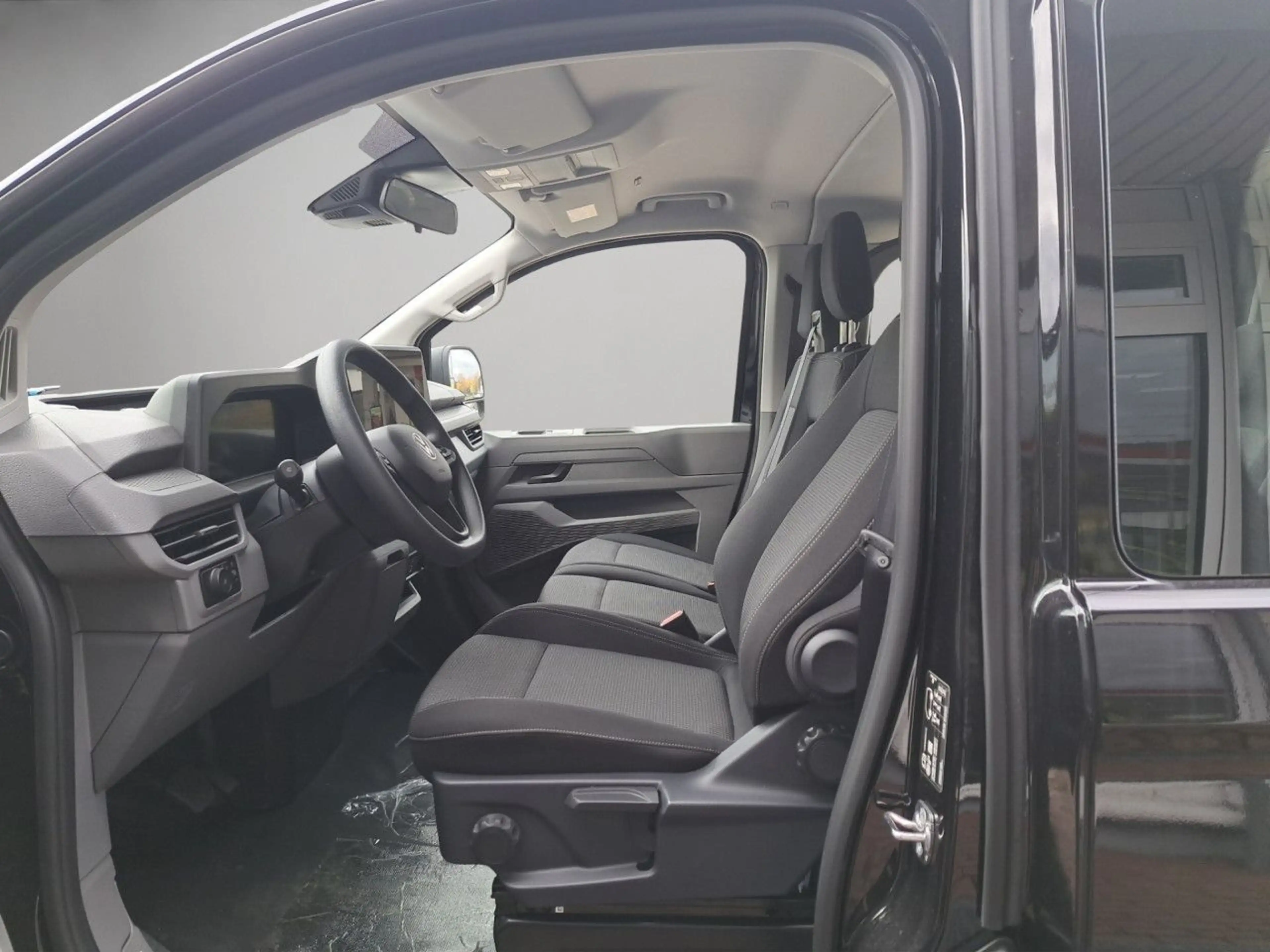 Volkswagen T7 Caravelle 4WD Allrad 2.0l TDI 9-Sitzer AHK Navi — photo 7