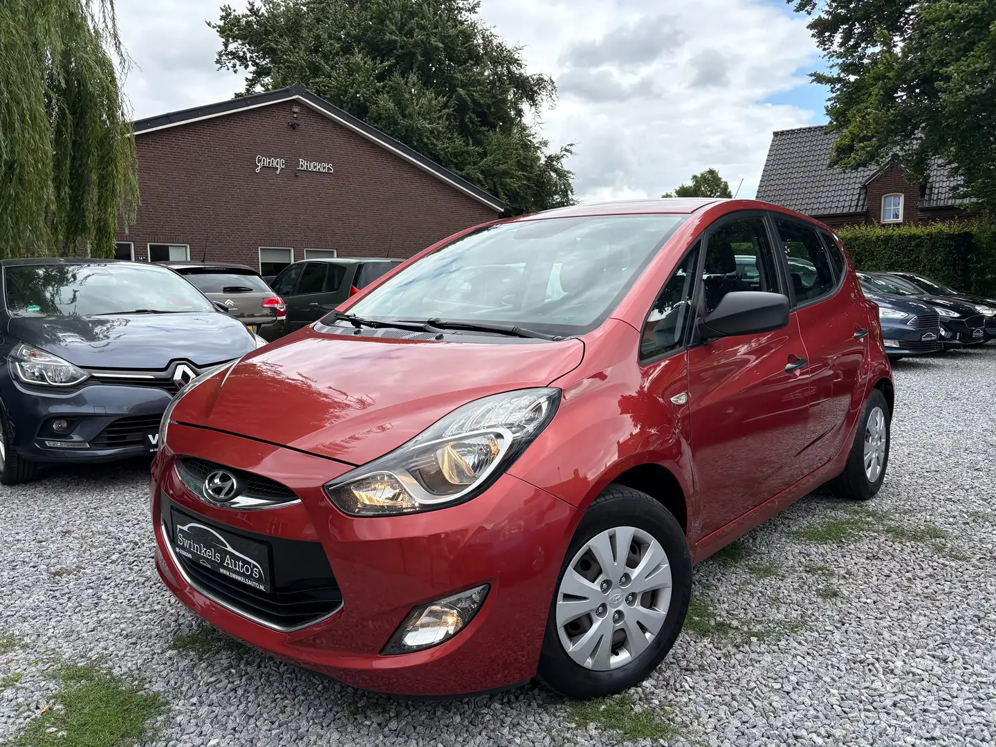 Hyundai iX20 1.4i i-Drive-airco-parkeersens.-trekh.-stoelverw. Bruin - 1