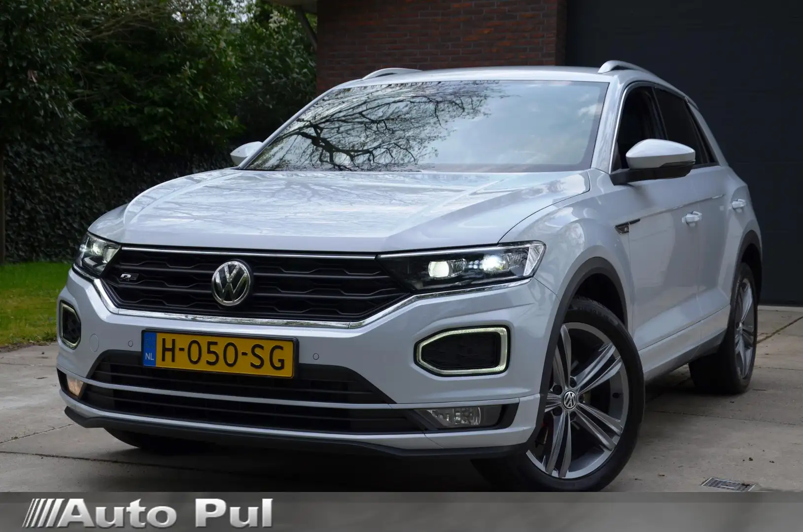 Volkswagen T-Roc 1.5 TSI Sport Business R Line Automaat/Navi/Ecc/Pd Wit - 1
