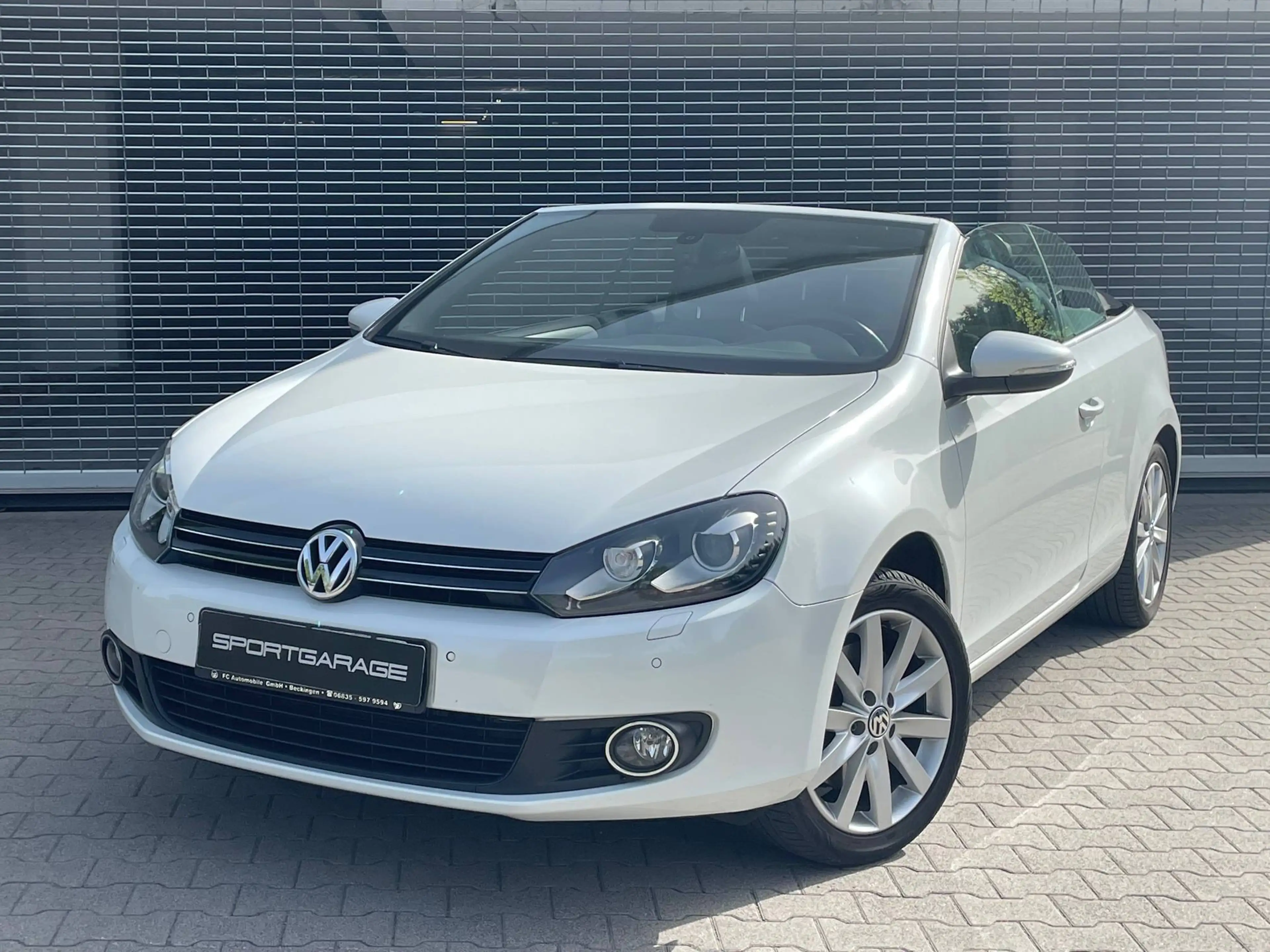 Volkswagen Golf Cabriolet DSG Navi Leder SHZ StaHz Bi-Xenon PDC Freisprech.