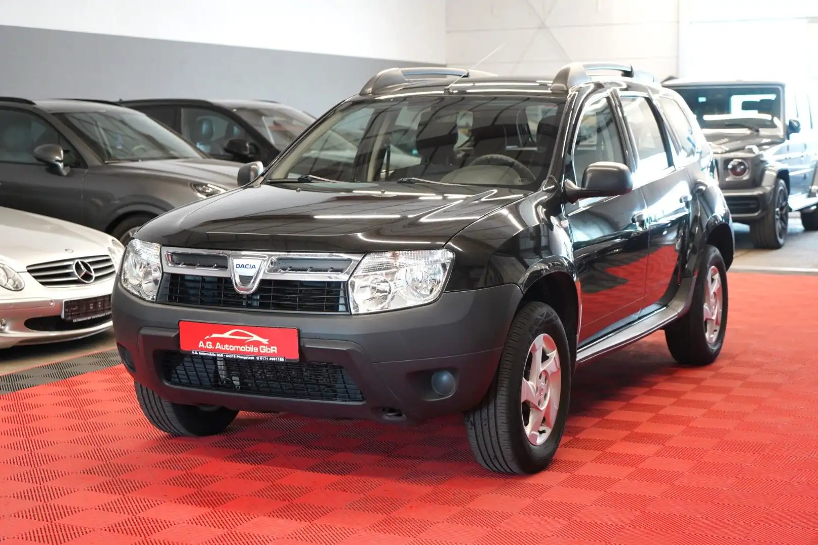 Dacia Duster 1.6 Klima*Einparkhilfe*Anhängerk*2.Hand* Schwarz - 1