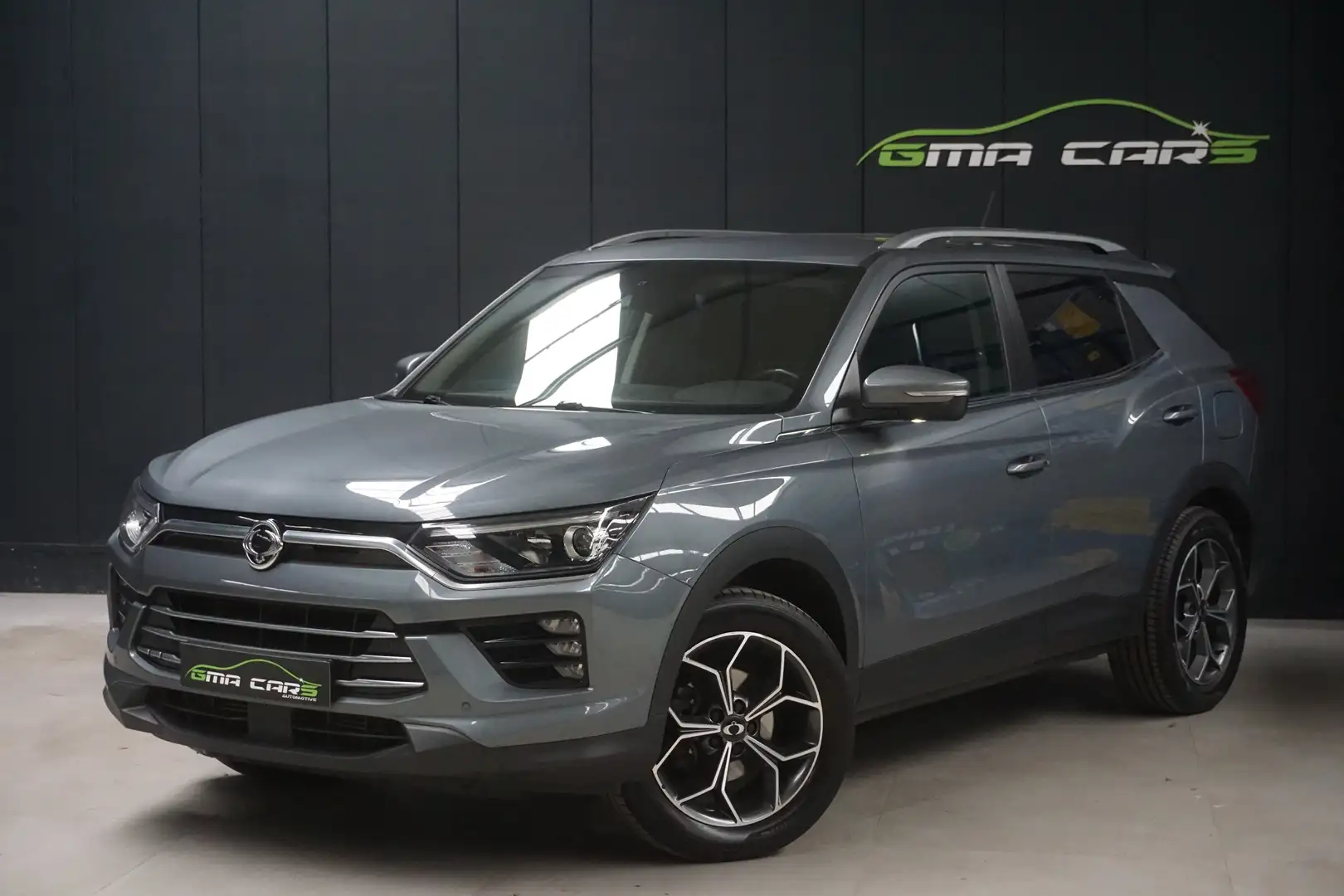 SsangYong Korando 1.5T-GDi 2WD Benzine Airco-Nav-Keyless-Gar antie Grijs - 1