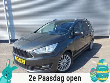 1.0 Titanium, airco,cruise,navigatie/camera,stoel/